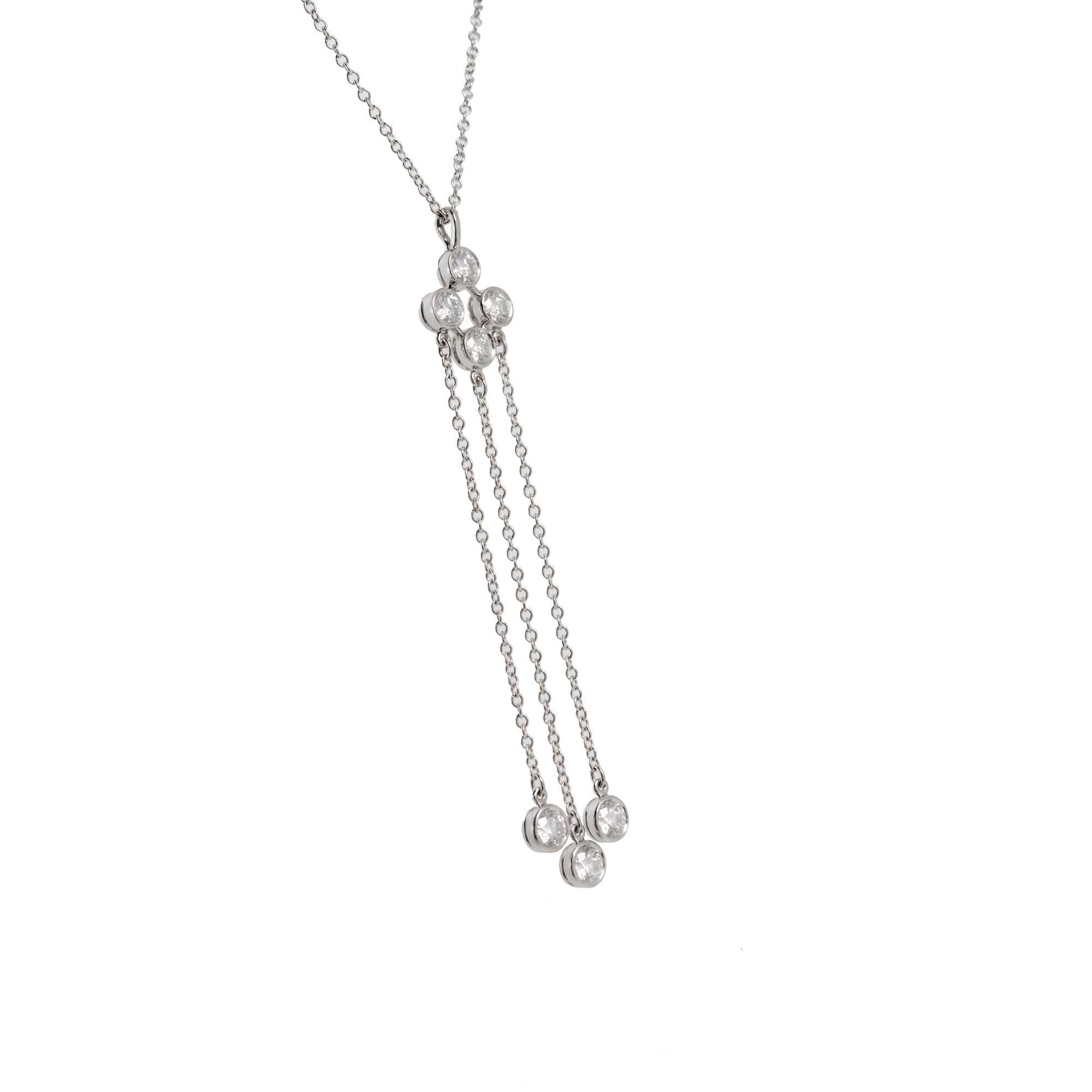 Tiffany & Co. Diamond Triple Dangle Platinum Necklace 

7 round full cut diamonds approx. total  .66 cts F VS
Platinum
Tested: Platinum
4.0 grams
Stamped: Pt 950
Total Length: 17 inch
Width: 1.08mm
Thickness / Depth: .89
Top to bottom: