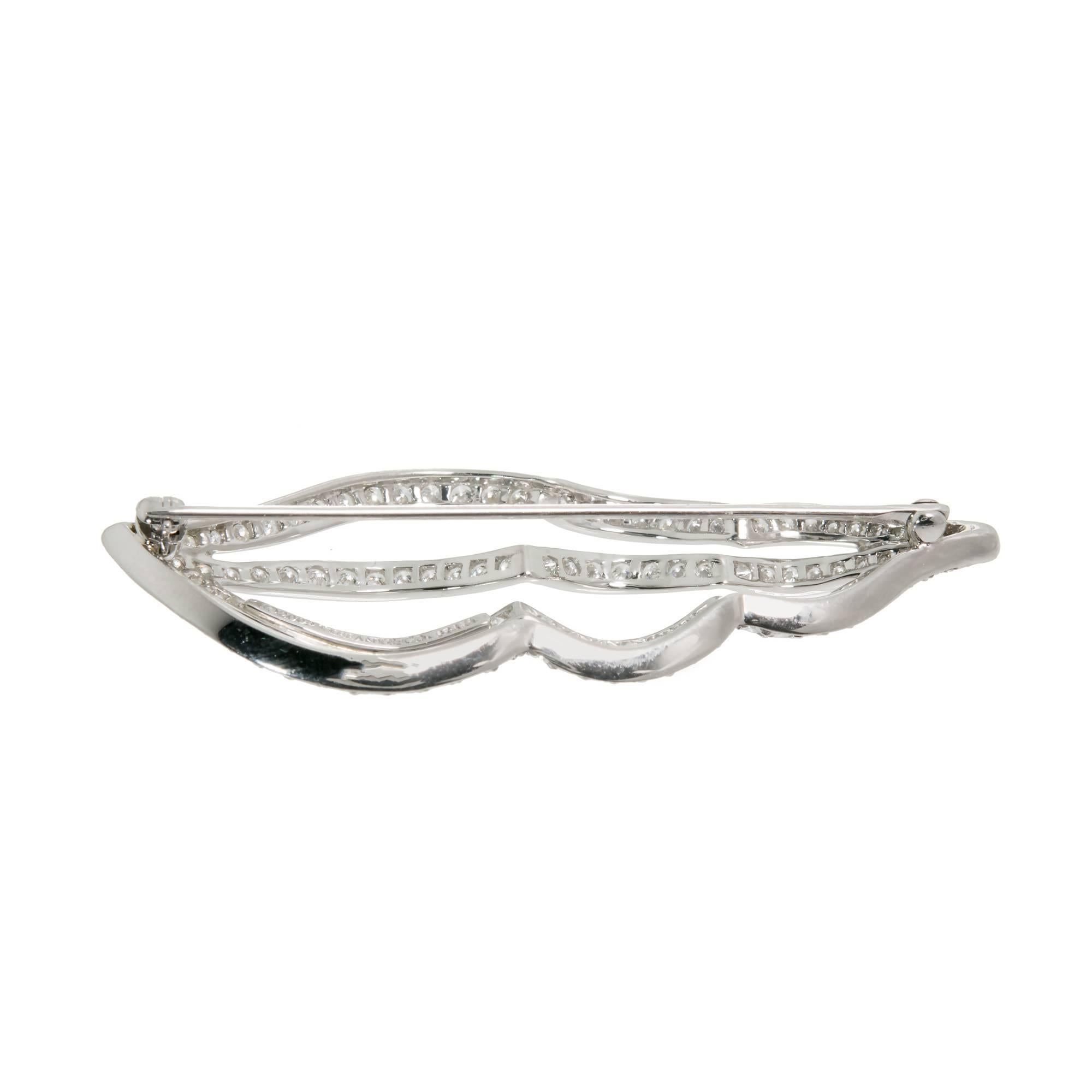 Tiffany & Co Platinum Diamond Shell Brooch. 119 round diamonds set in Platinum. 

119 round diamonds full cut F VS Approx. total weight 2.00 cts
Platinum
Tested: Platinum
Stamped: Pt 950
Hallmark: c 2004 Tiffany & Co
Top to Bottom: 56.88mm or 2.24
