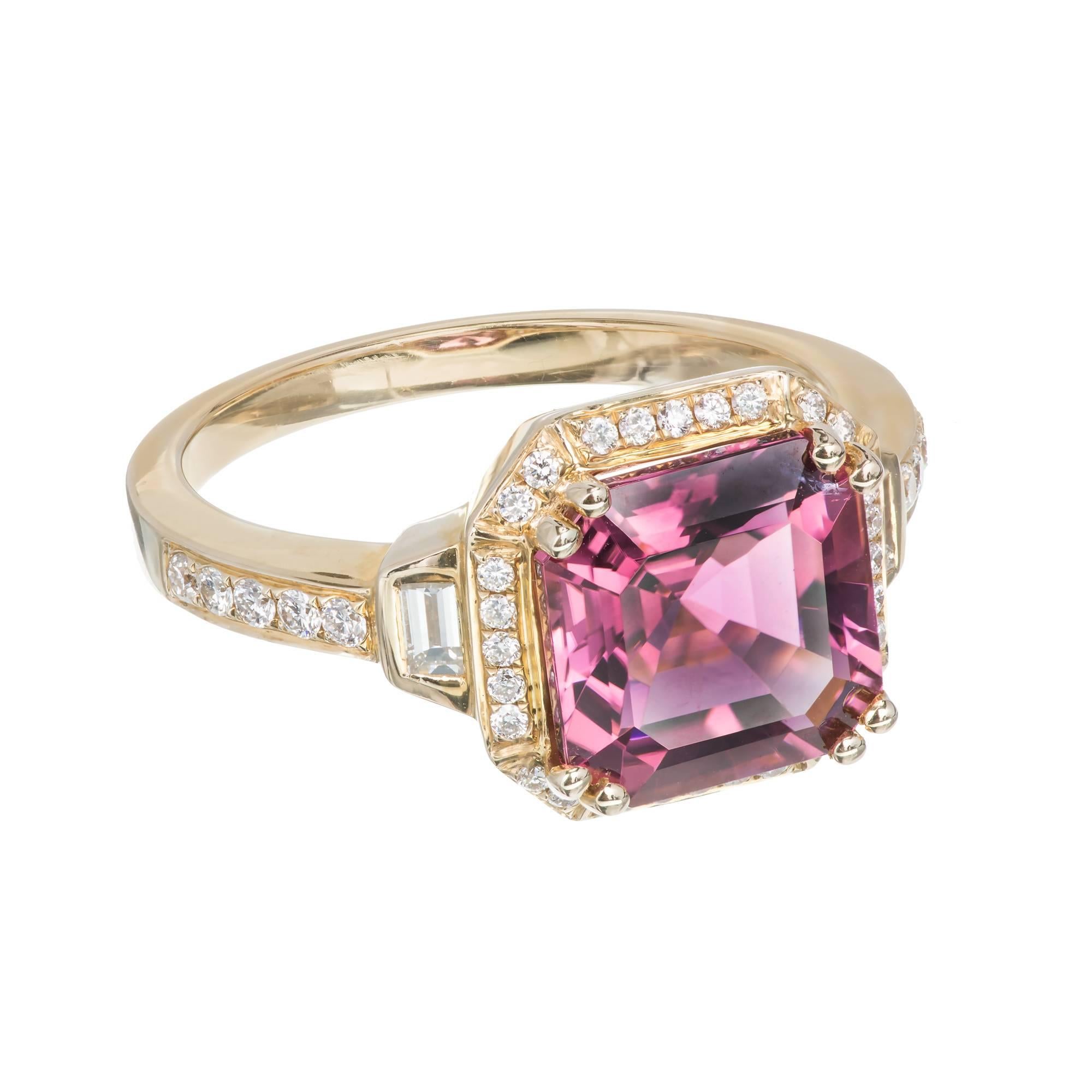 Square Emerald cut pink Tourmaline and diamond halo ring.  14k yellow gold signed JLJ. Small natural inclusions near one prong.

1 pink Tourmaline, approx. total weight 3.50cts, SI
38 round full cut diamonds, approx. total weight .15cts, H, VS
2