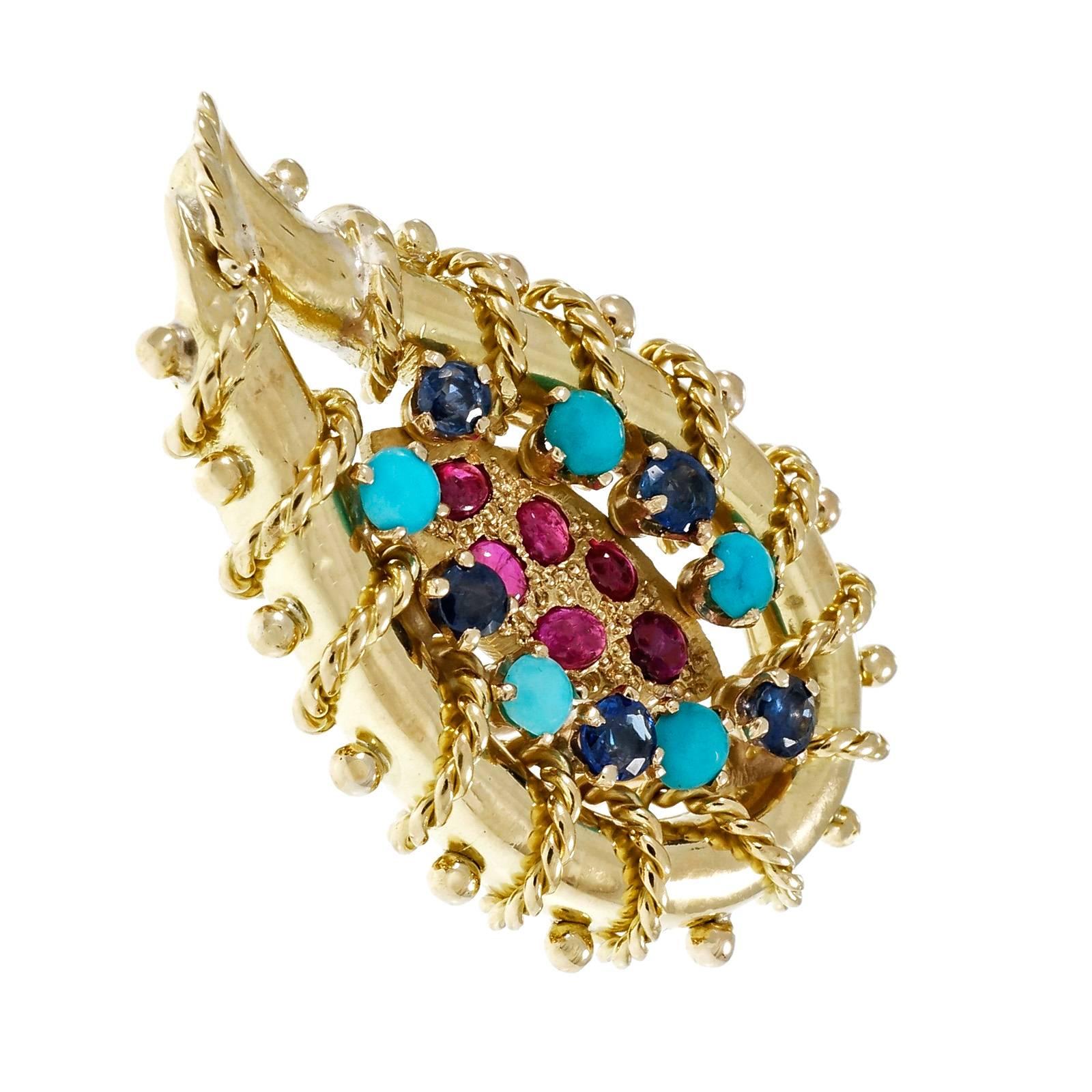 1950’s 18k yellow gold Ruby Turquoise Sapphire clip post earrings. Rope detail. Earrings and post tested 18k and 14k and Omega clips

12 oval cabochon red Rubies, approx. total weight .39cts, 2.32 – 2.52 x 1.69 – 1.88mm
10 round blue Sapphires,