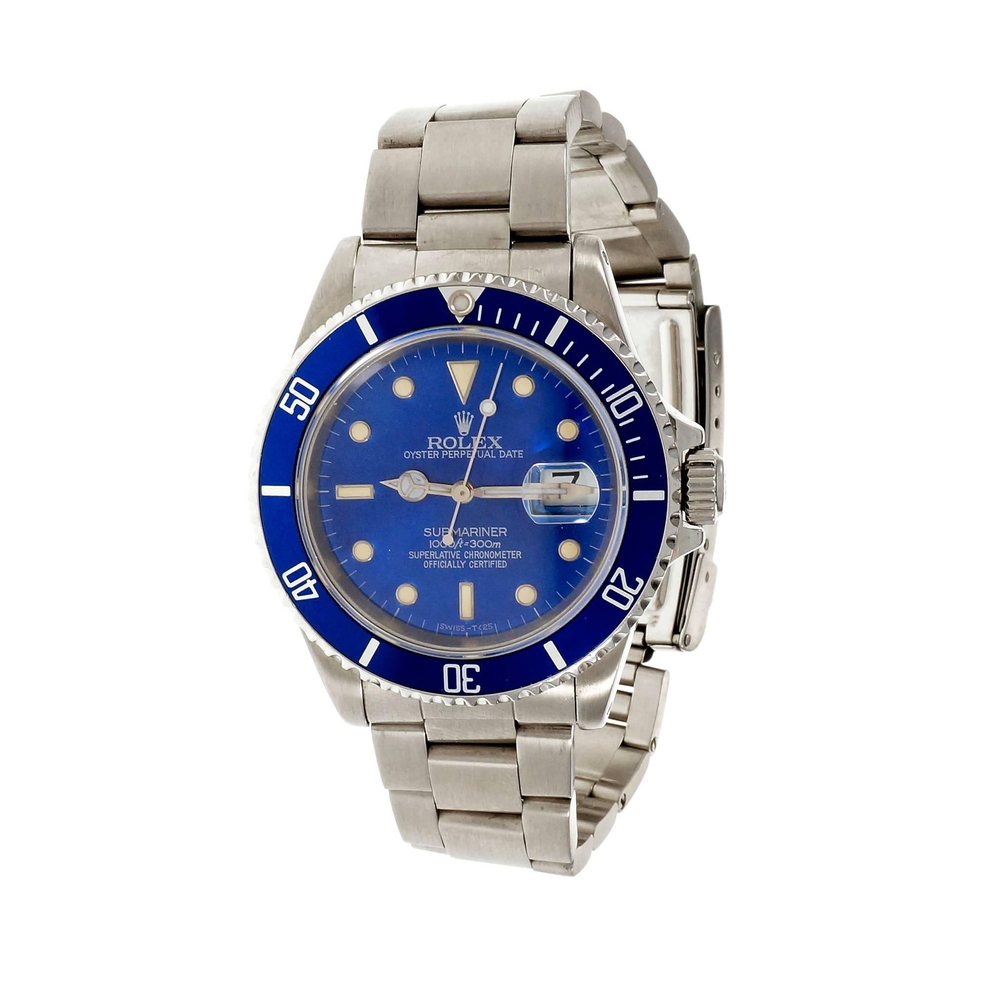 Steel Rolex Submariner 16610 with customized bright blue dial and bezel rim. Matt finish Rolex Oyster band.  © 1992.

Steel
131.0 grams
Band length: 8.5 inches
Length: 47mm
Width: 38mm
Band width at case: 20mm
Case thickness: 12.9mm
Band: Rolex