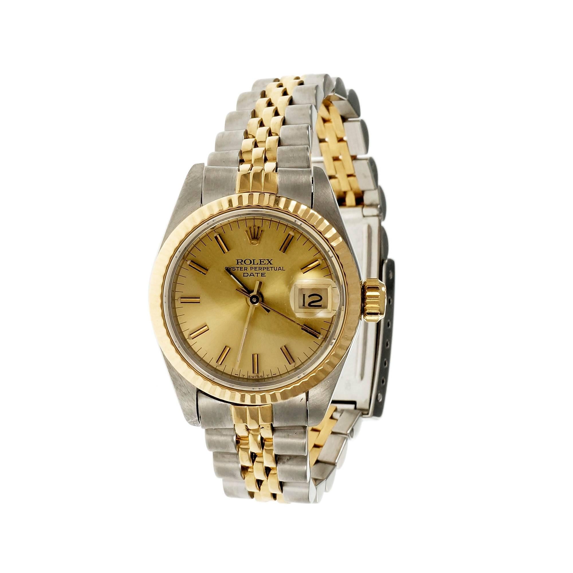Ladies Rolex 18k gold and steel Date wrist watch. Very little band stretch. Gold tone rich looking stick figure dial. Circa 1984.

18k yellow gold 
 Steel
54 grams
Band length:6.5 inches – links are available
Length: 31.7mm
Width: 26mm
Band width at