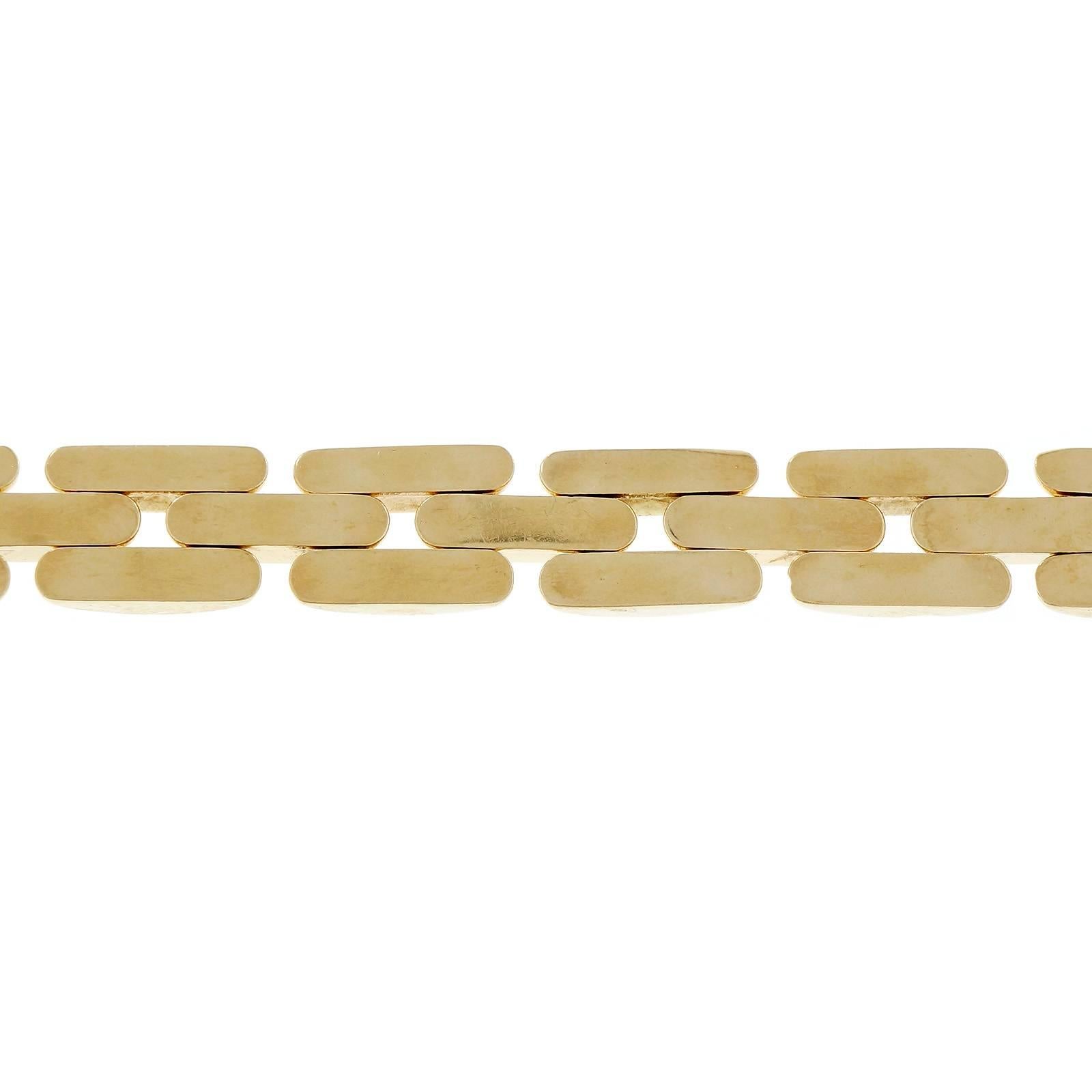 Vintage 1960’s 3 row 14k yellow gold track faceted bracelet. Hollow construction.

14k yellow gold
28.5 grams
Tested and stamped: 14k
Hallmark: JW Italy
Length: 7.25 inches – Width: 13.52mm – Depth: 4.52mm
