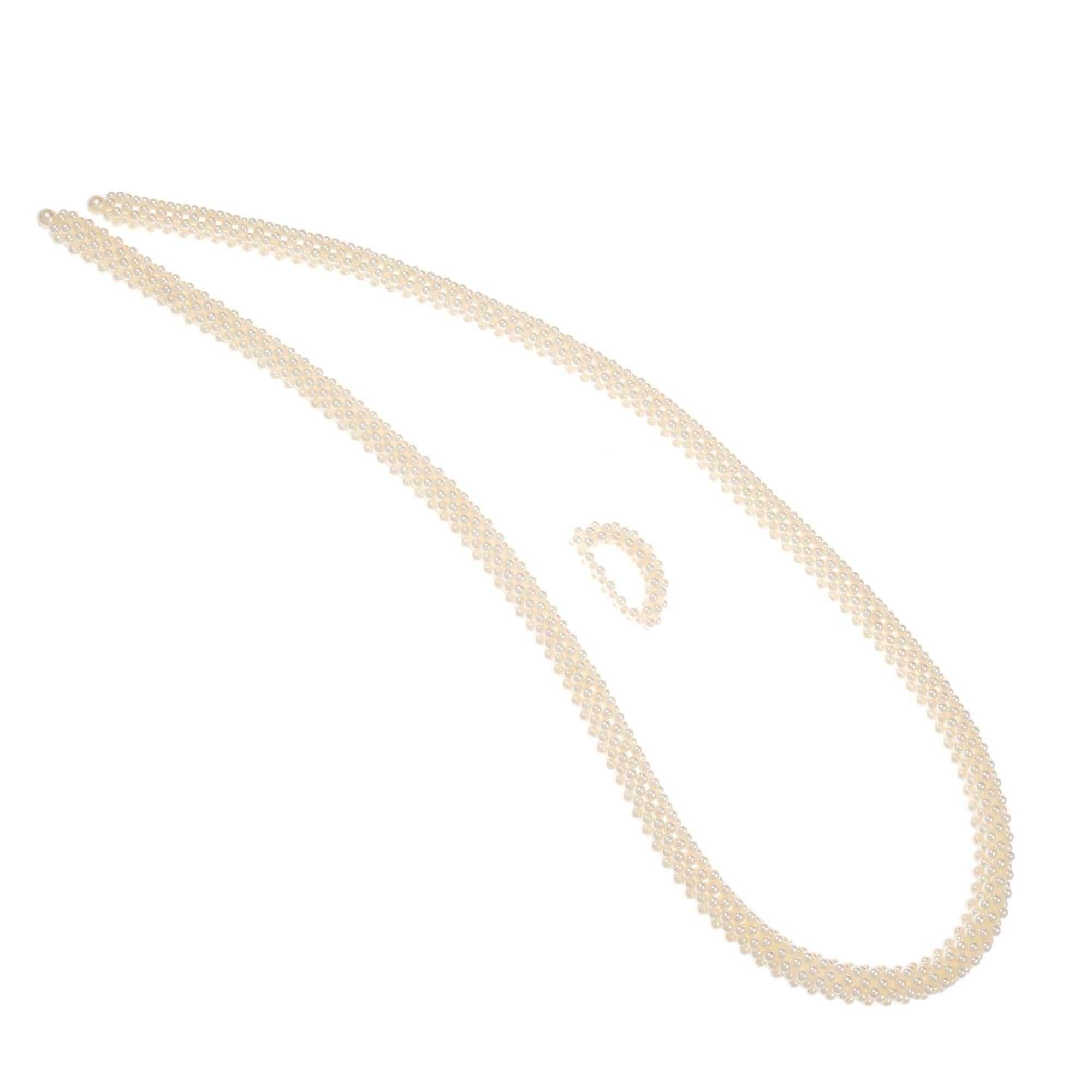 Mikimoto Japanese Akoya cultured Pearl unusual necklace. 3-D 10 row “Y” style 32 inch necklace with woven pearl adjustable slide.

1523 Japanese Akoya cultured Pearls, 3.4mm, color A+
2 Japanese Akoya cultured Pearls, 6.5 – 7mm, color A+
Mikimoto