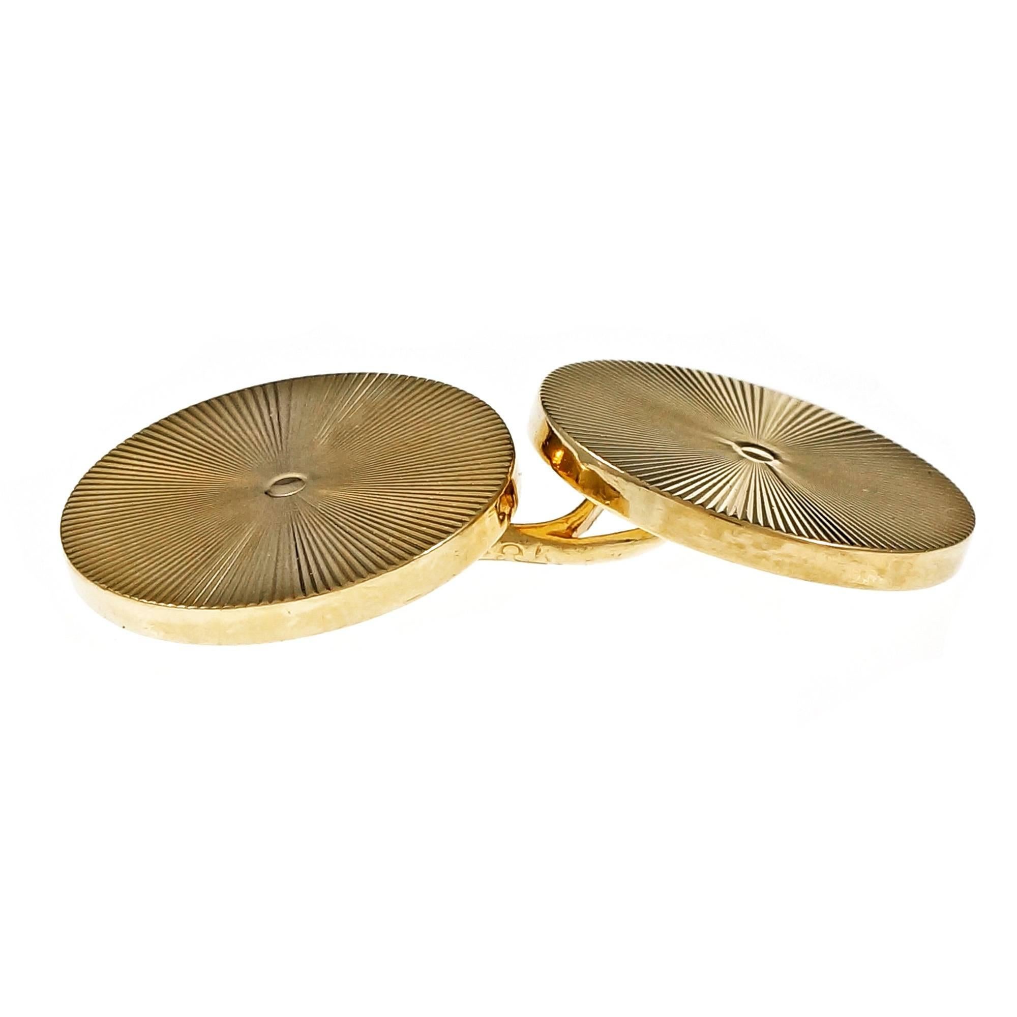Tiffany & Co Larter & Sons 1950 -1960 heavy weight double sided textured
14k yellow gold cuff links.

14k yellow gold
Tested and stamped: 14k
Hallmark: Tiffany & Co
14.6 grams
Top to bottom: 14.73mm or .58 inch
Width: 14.73mm or .58 inch
Depth: