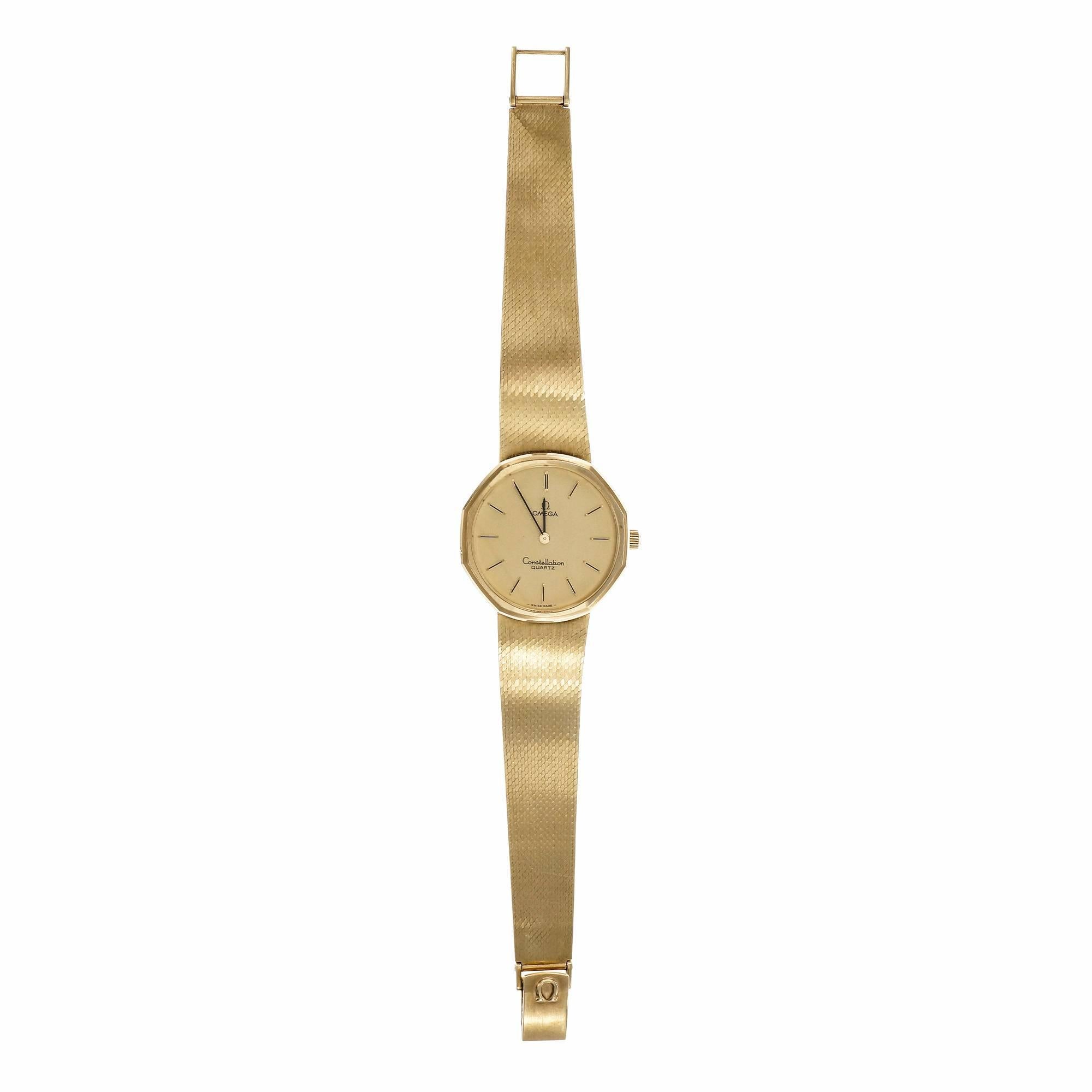 Omega Constellation Quartz wrist watch. 14k gold with Omega 14k mesh band.

14k yellow gold
67.5 grams
Band length: 7.5 – 7.75 inches
Length: 33mm
Width: 33mm
Band width at case: 18mm
Case thickness: 7.4mm
Band: 14k Omega 1291/253
Crystal: