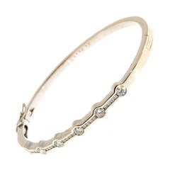 Bracelet en or serti de diamants en canal et en lunette