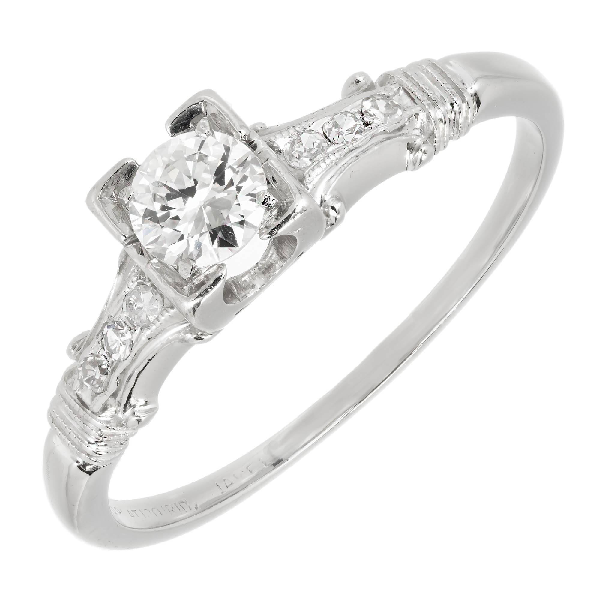Vintage 1940-1950 Jabel Platinum engagement ring with a transitional cut  EGL certified center Diamond and side accent Diamonds. 

1 transitional brilliant cut Diamond, approx. total weight .30cts, F – G, VS2, EGL certificate # US313982601D 
6