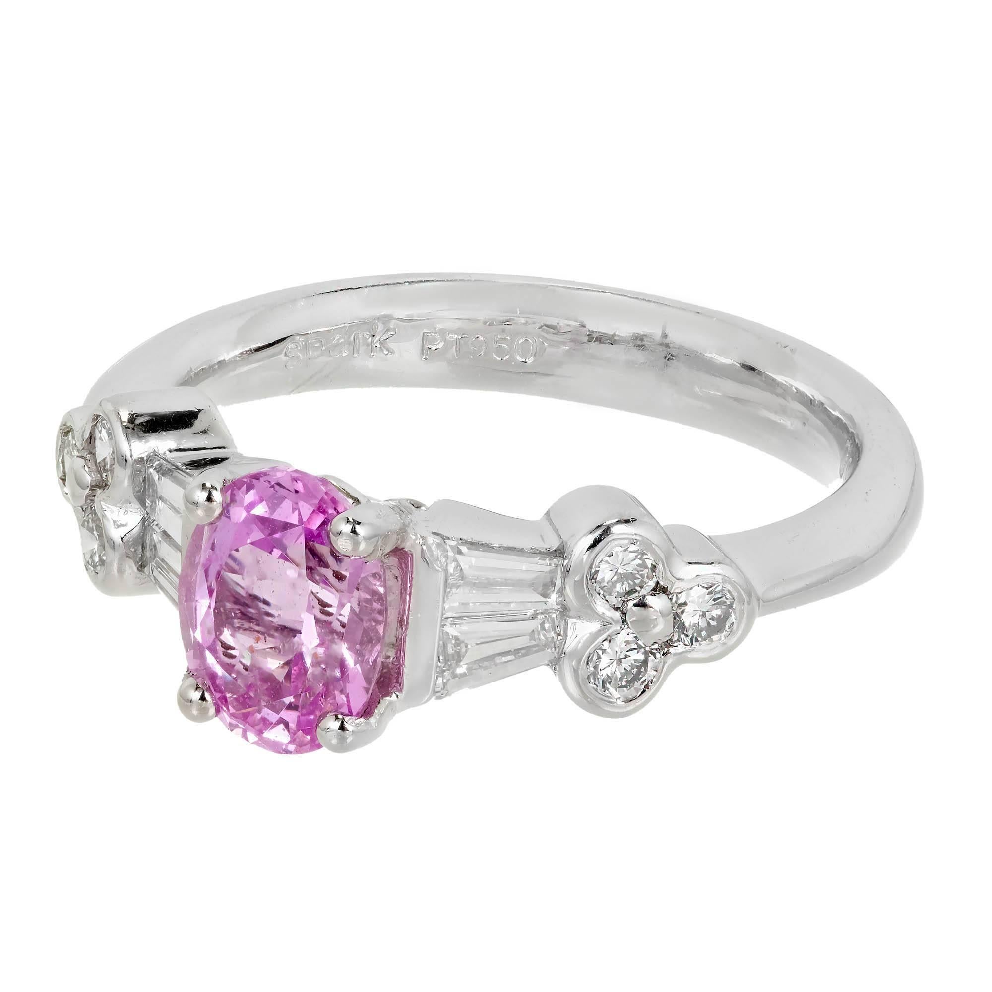 Oval pink natural GIA certified no heat Sapphire ring from Spark. Fine round and baguette Diamonds in a platinum setting. 

1 oval purplish pink Sapphire, approx. total weight 1.36cts, no heat, GIA certificate #2185316023 
6 round Diamonds, approx.