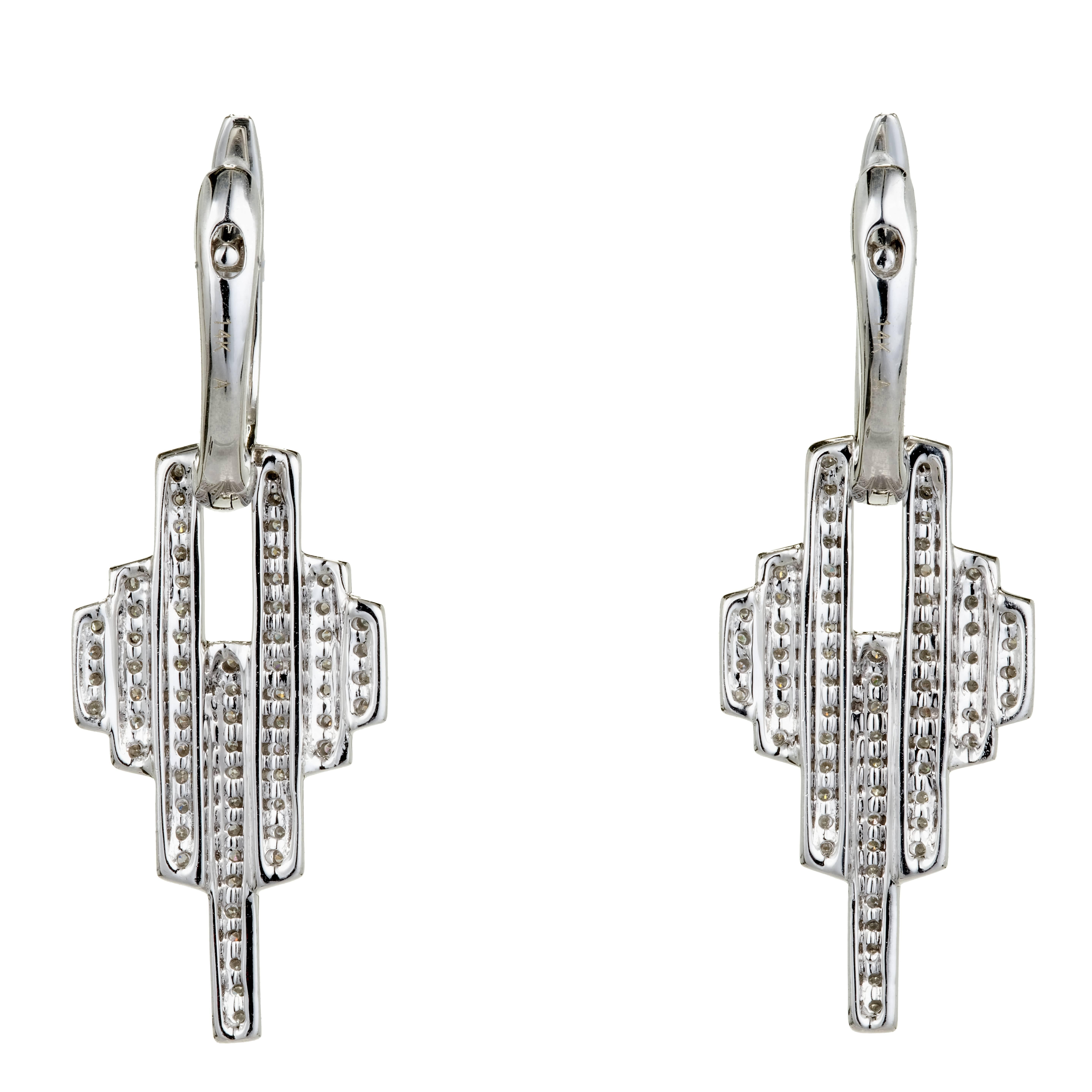 Diamond hoop earrings with an Art Deco Inspired Diamond dangle section. 14k white gold with bright sparkly full cut Diamonds.

160 round full cut Diamonds, approx. total weight .50cts, H, VS – SI
14k white gold
Tested and stamped: 14k
5.8