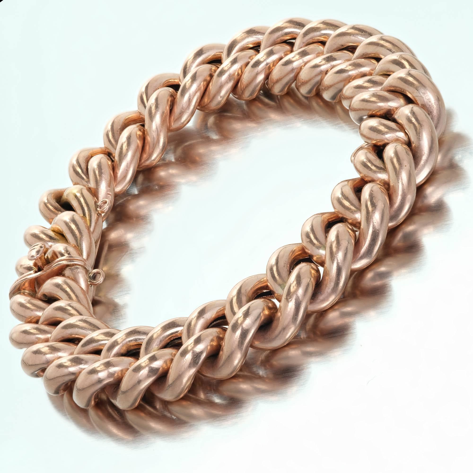 Vintage 1920-1930 puffed link 12k rose gold bracelet. European hallmarks. Natural patina and hidden built in catch. Fold down jump ring for charm to attach if wanted.

12k rose gold
Tested and stamped: 12k
Hallmark: European Hallmarks
Width: