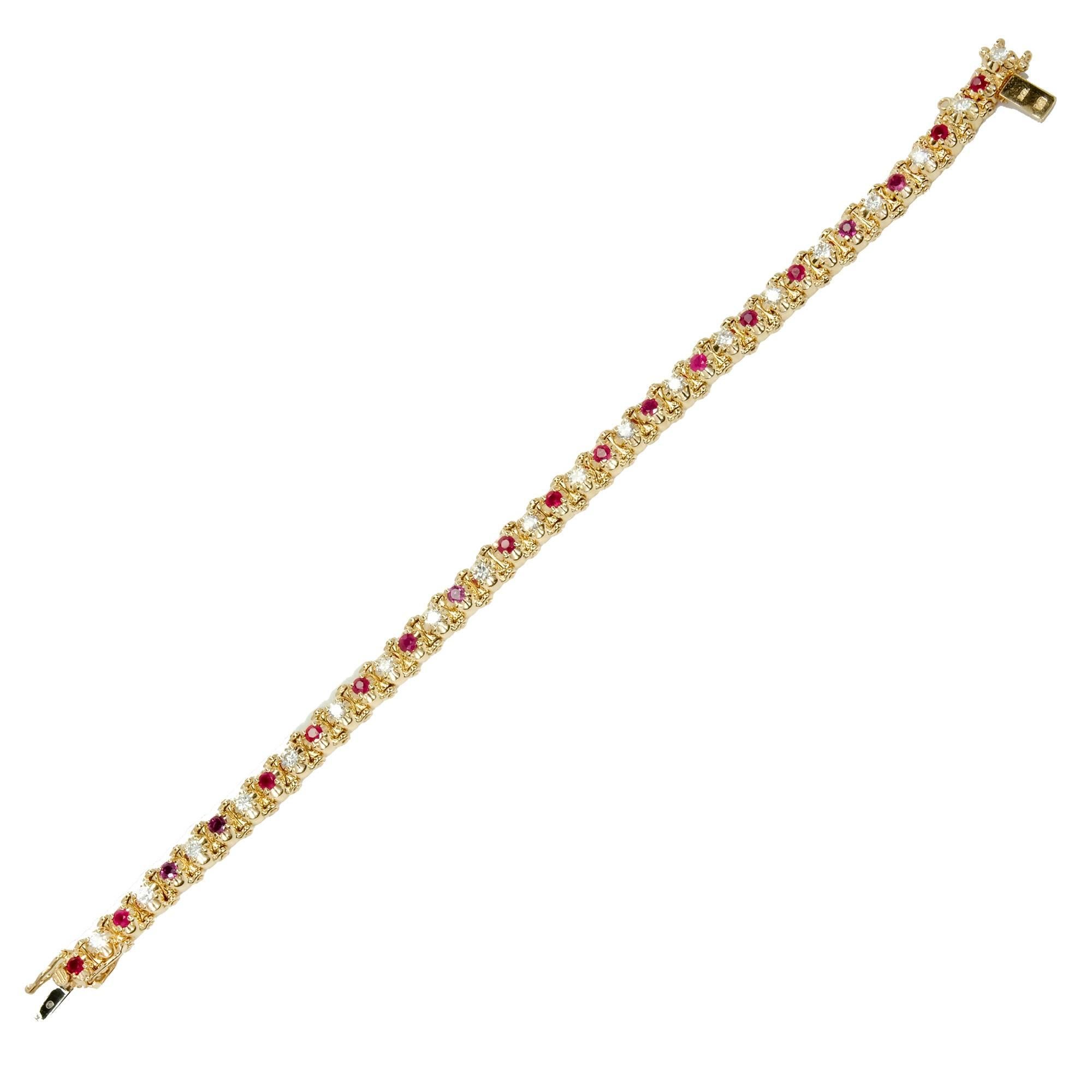 Round Ruby and diamond full cut 14k yellow gold bracelet with double side lock catches and underside safety.

20 round Diamonds, approx. total weight 1.20cts, H – I, VS1 – SI1
20 round red Rubies, approx. total weight 2.00cts, SI, 2.5mm
14k yellow