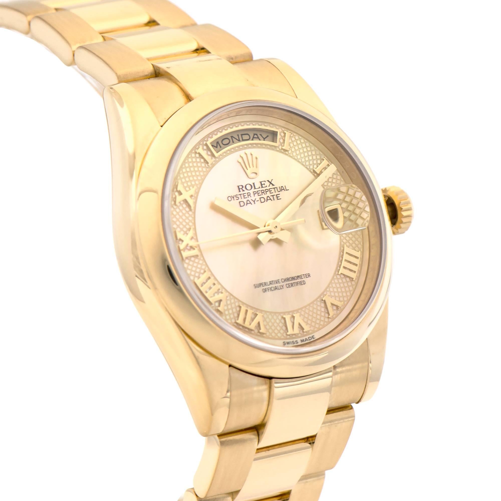 Rolex Day-Date President ref 118208 champagne mother of pearl deco roman dial with day and date functions. 

Mother of pearl dial
36mm 18k yellow gold case
Bezel Rolex domed 18k yellow gold
Rolex 73208 18k yellow gold oyster band
Rolex 3155 31 jewel