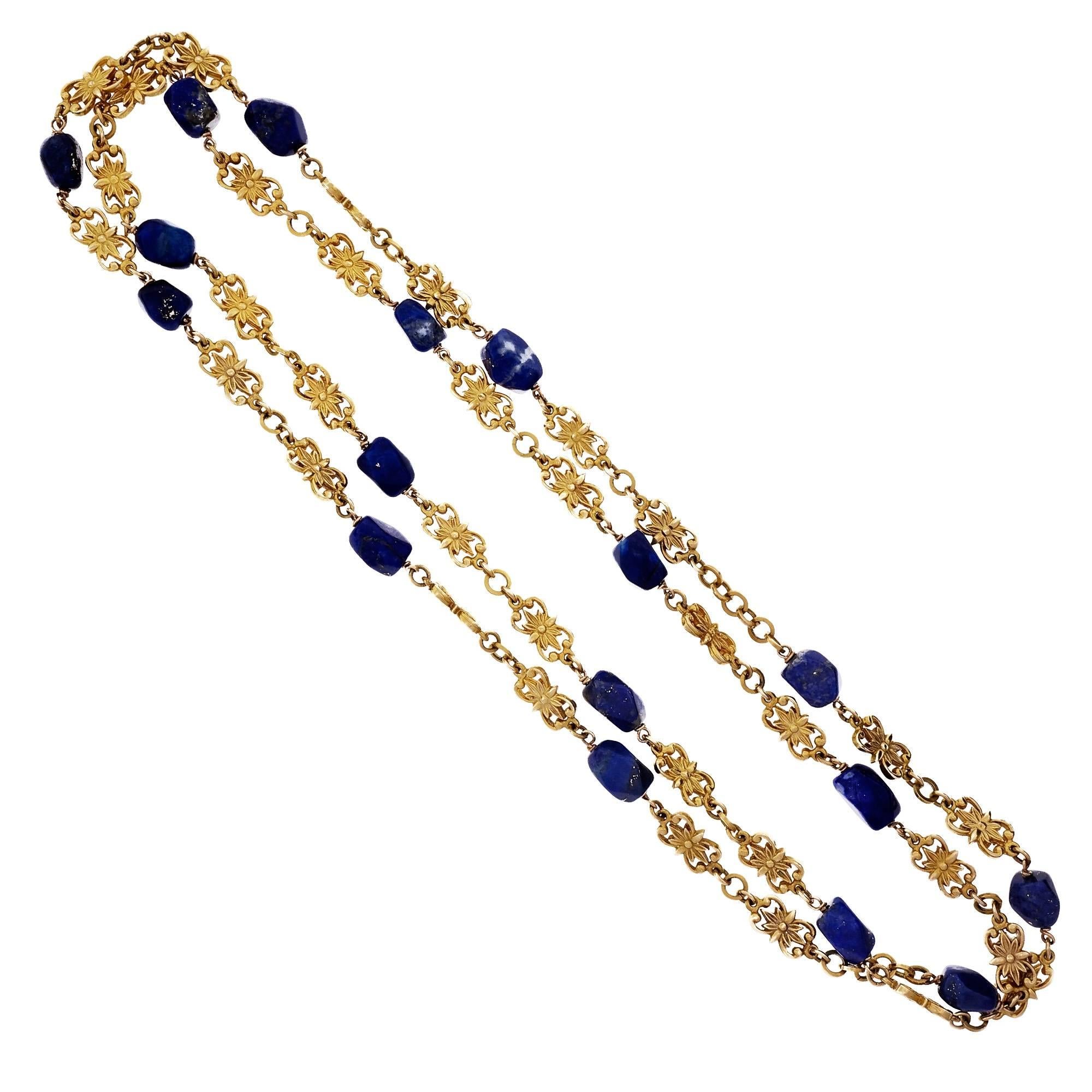 Vintage 1930 heavy 18k yellow gold gem natural GIA certified natural untreated Lapis faceted bead necklace. Natural patina. Violet blue color.

18k yellow gold
18 faceted bright violet blue Lapis beads, 12.14 x 7.02 x 6.93mm, GIA certificate