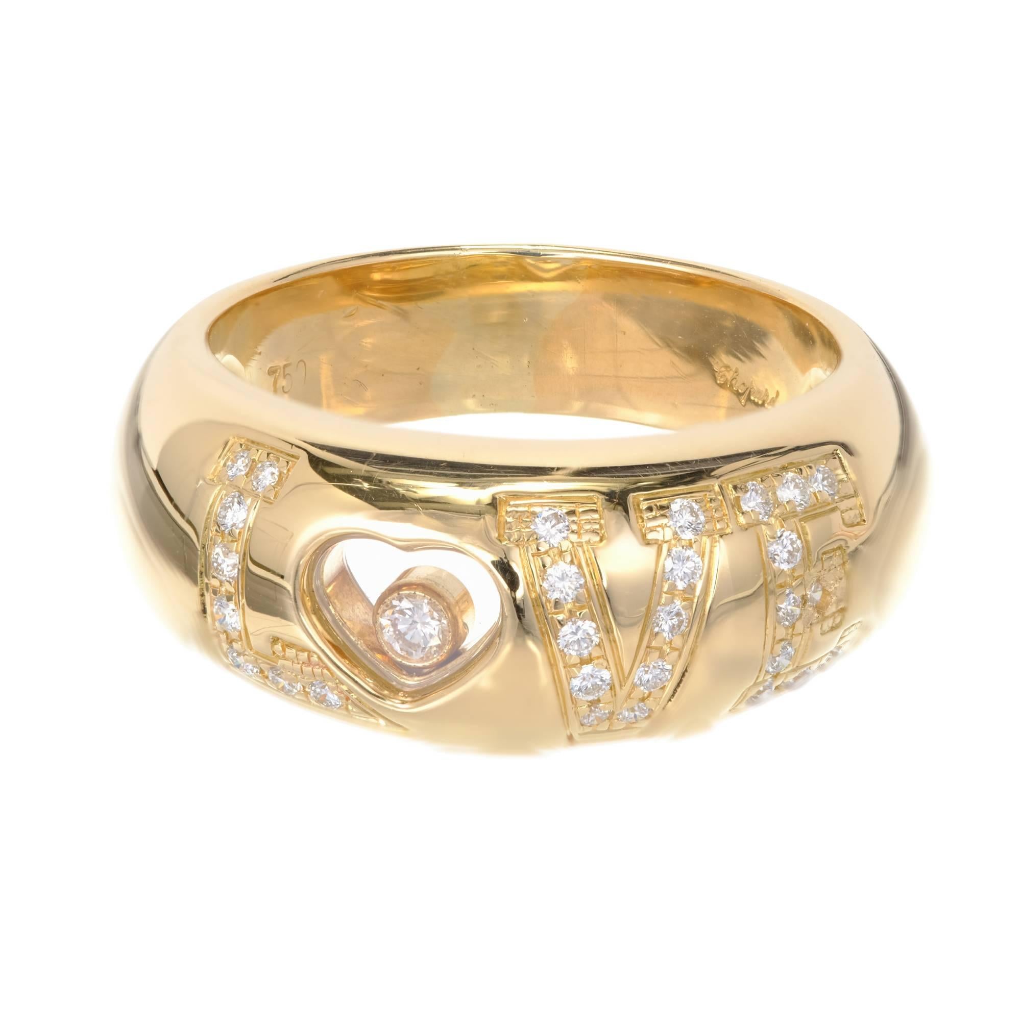Chopard Happy Diamond 18k yellow gold Love ring.

24 full cut Diamonds, approx. total weight .38cts, F, VVS
Size 7.75 and sizable
18k yellow gold
Tested: 18k
Stamped: 750
Hallmark: Chopard
9.8 grams
Width at top: 8.6mm
Height at top: 6mm
Width at