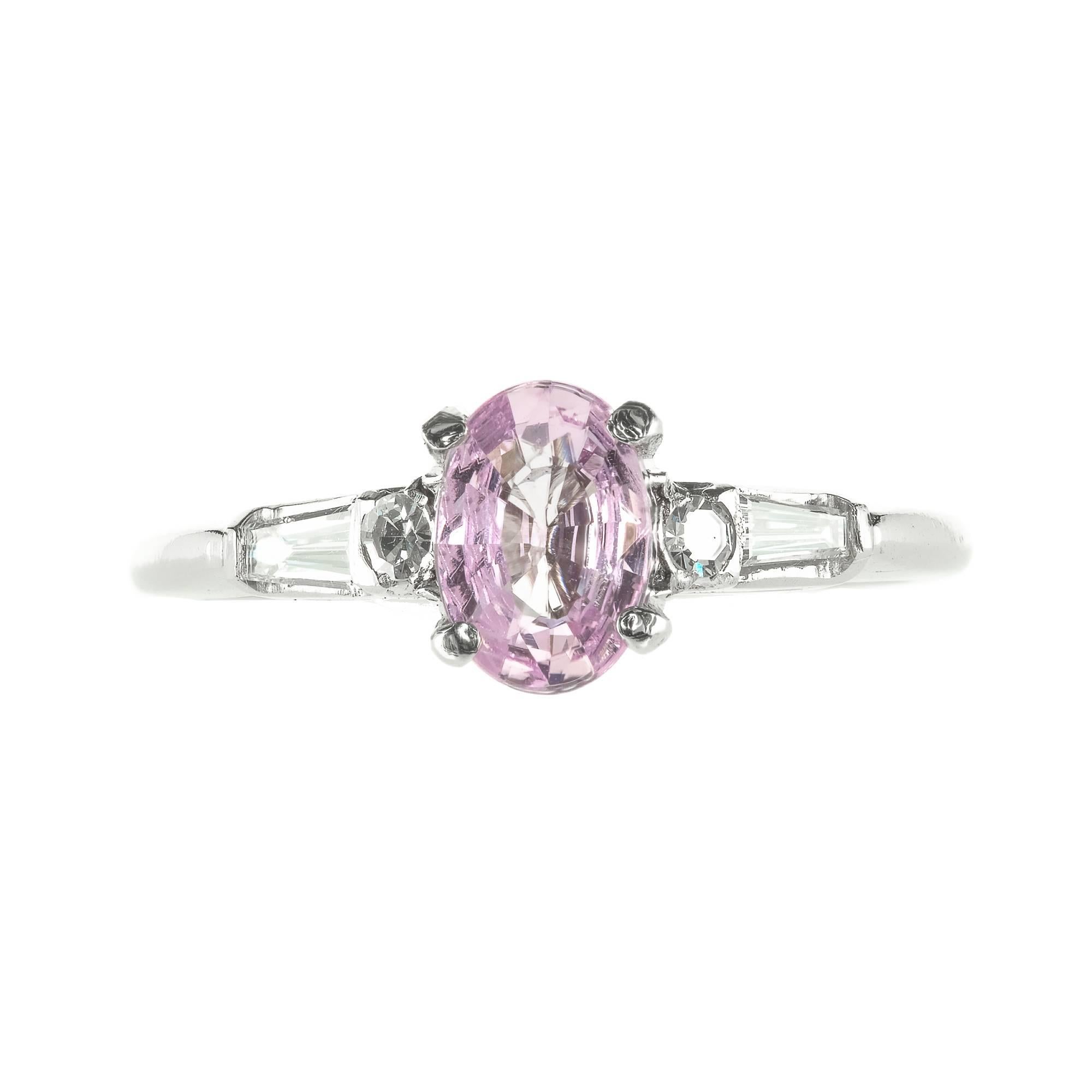 Natural GIA certified no heat soft light purplish pink Sapphire and diamond engagement ring in a platinum setting.

1 oval light purplish pink Sapphire, approx. total weight .74cts, no heat, GIA certificate #2171619035
2 round diamonds, approx.
