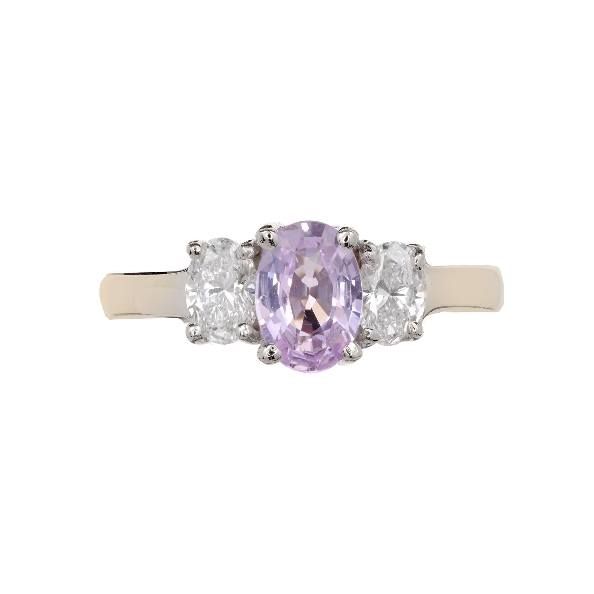 Peter Suchy GIA certified light pink purple Sapphire, simple heat only engagement ring. 14k white gold setting with oval side diamonds.

1 oval light pinkish purple Sapphire, approx. total weight .88cts, simple heat only, 4.78 x 3.50mm, GIA