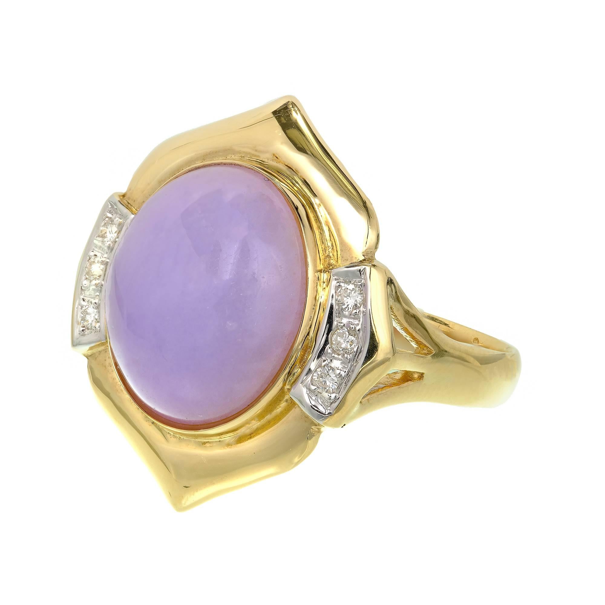 Lavender Jadeite Jade ring with sparkly full cut Diamond accents in a handmade 14k yellow gold setting.

1 oval cabochon purple Jadeite Jade, 13.92 x 12.24 x 7.06mm, GIA certificate #2185640058
6 full cut Diamonds, approx. total weight .10cts, G,