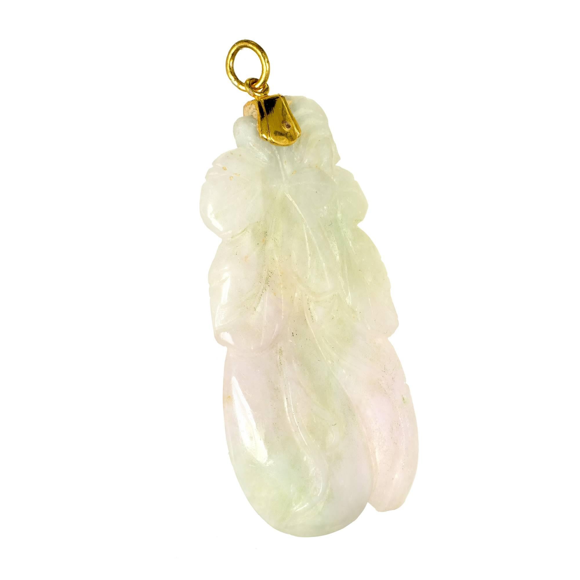 Translucent natural carved Jadeite Jade pendant with a 22k yellow gold cap and bail. GIA certified variegated green & very light purple. chain not included. 

1 pierced carved variegated green and very light purple Jadeite Jade, 56.56 x 35.08 x