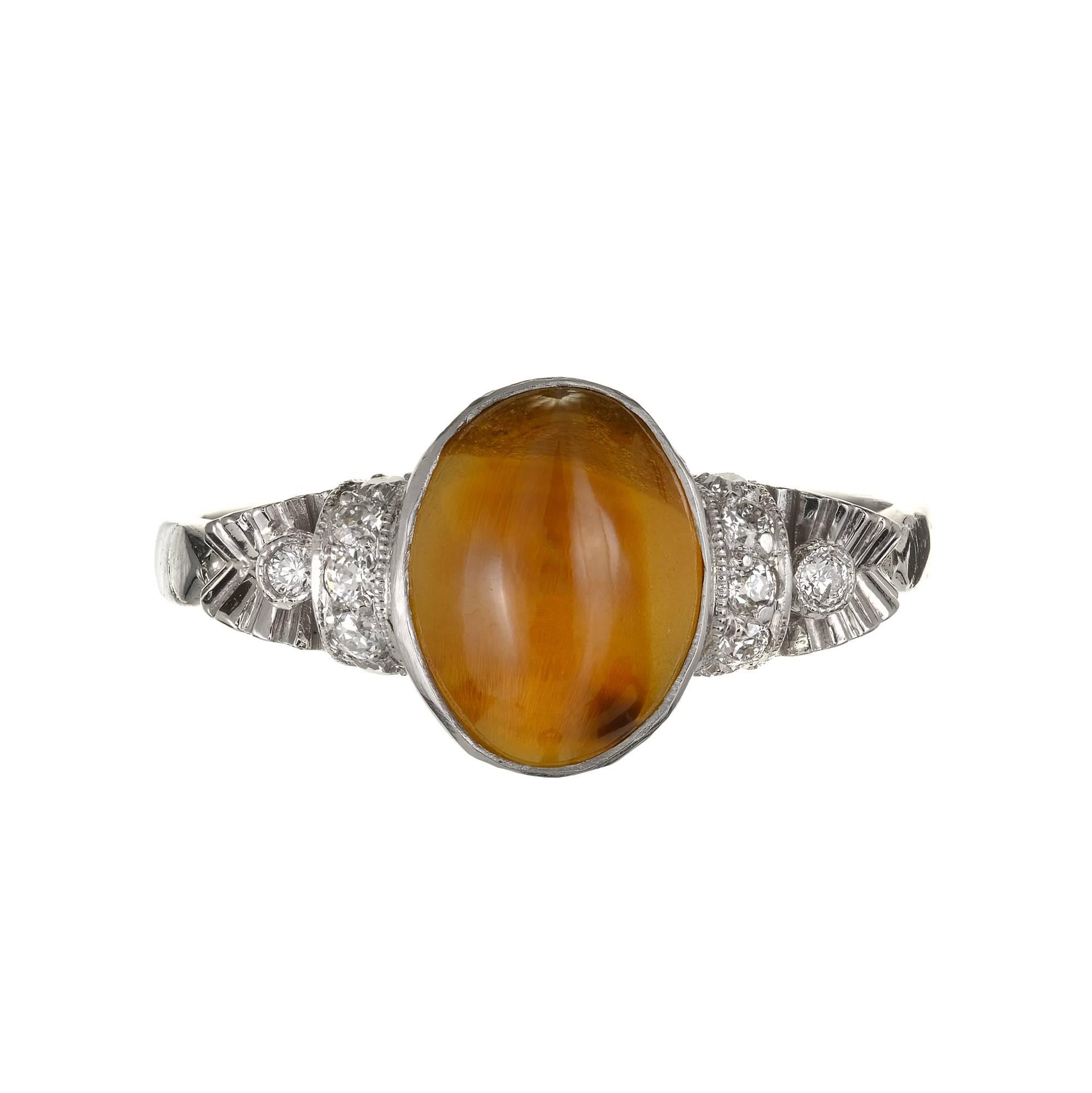 Art Deco 2.71ct Chrysoberyl Cat’s Eye and diamond Platinum engagement ring.  1920-1930 ring. GIA certified natural bright brown orange Chrysoberyl with a well-defined Cat’s Eye in a platinum setting with diamond accents. This stone exhibits a slight