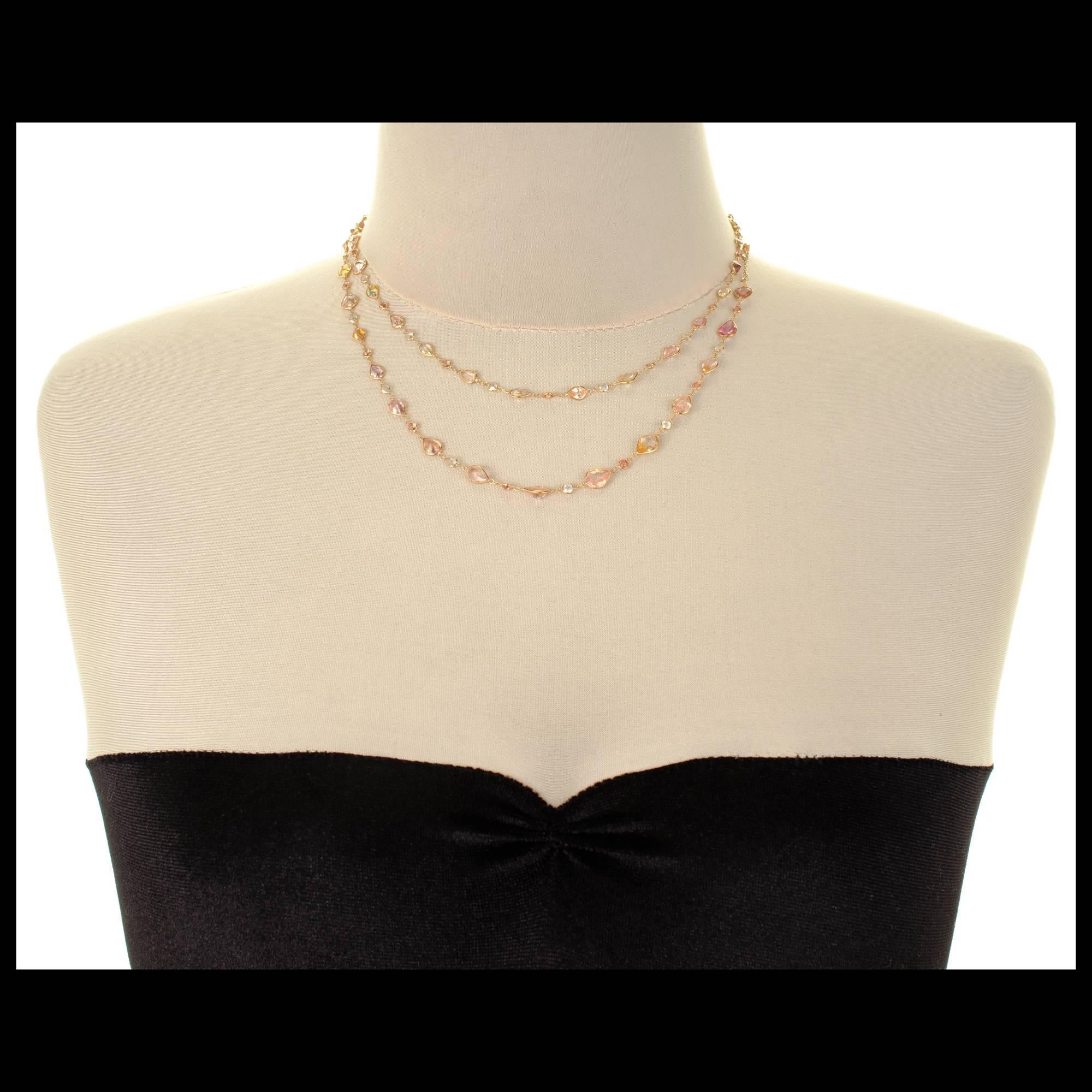 38 inch long 18k rose gold genuine multi color Sapphire long chain Necklace. GIA random tested as natural color simple heat only. Pear Sapphire go with the point down from the clasp down each side. Round stone separate the pears and alternate pink