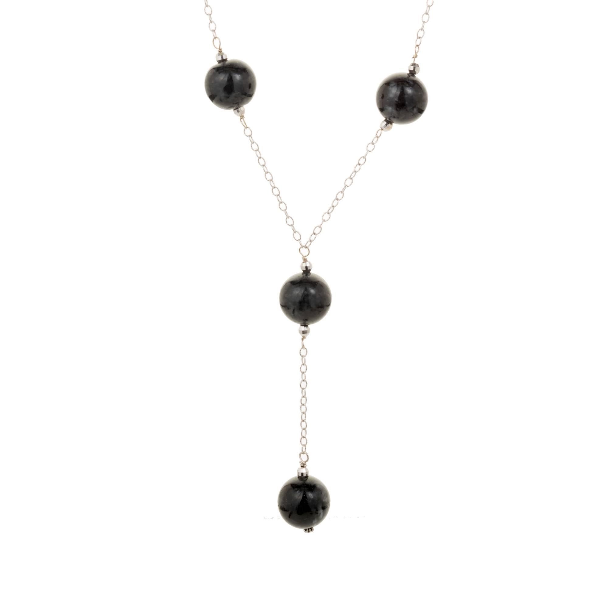 Natural black Jadeite Jade 12mm “Bead By The Yard” style necklace on a 20 inch 14 white gold chain. GIA certified natural Jadeite Jade.

14k white gold
8 round black  Jadeite Jade 12.48 x 12.25mm, GIA certificate #1182601974
28.03 grams
Tested and