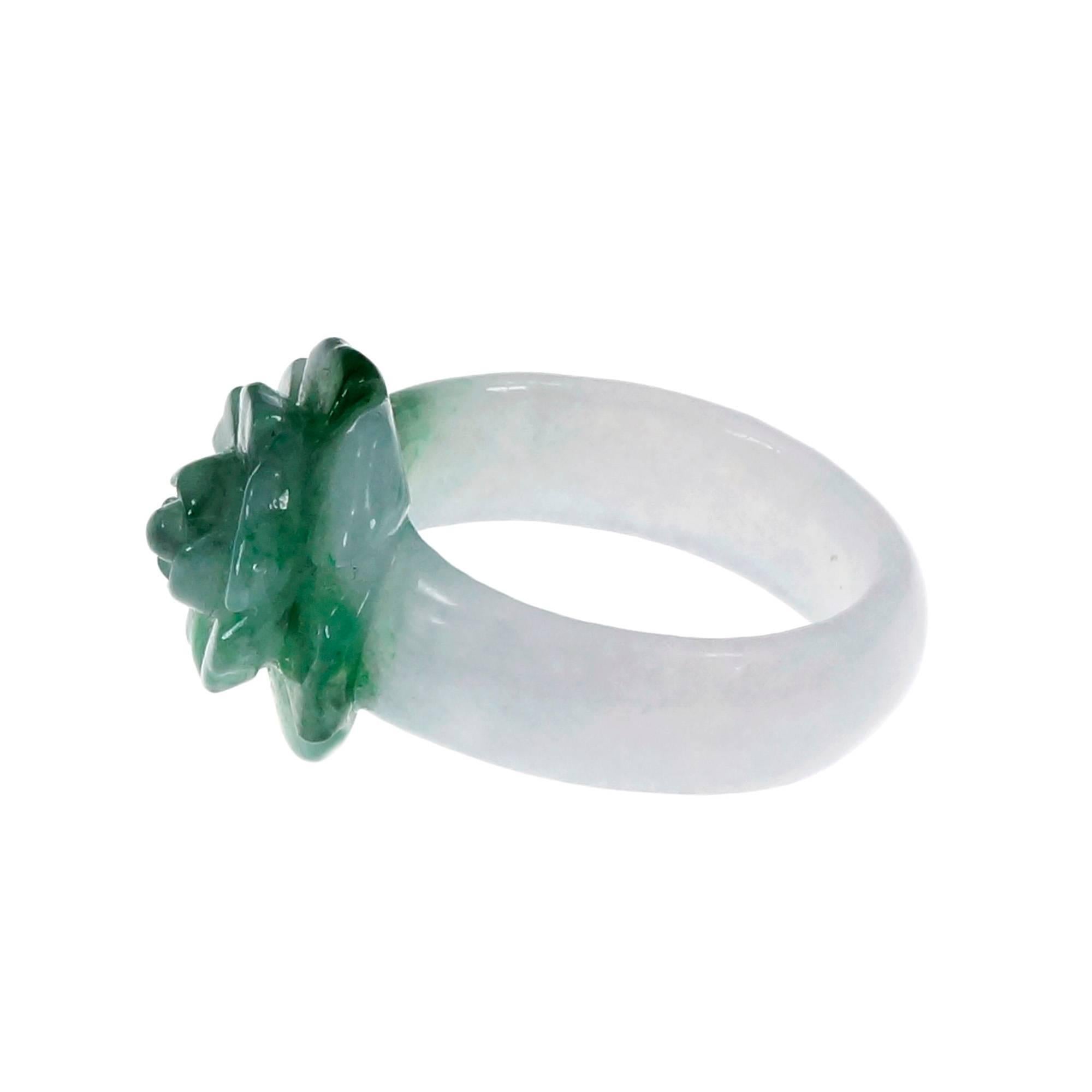 Natural Jadeite Jade blended green and white color flower cocktail ring. Translucent GIA certified natural Jadeite Jade. this ring is not sizable

1 carved variegated green white Jadeite Jade, approx. total weight 27.34cts, GIA certificate