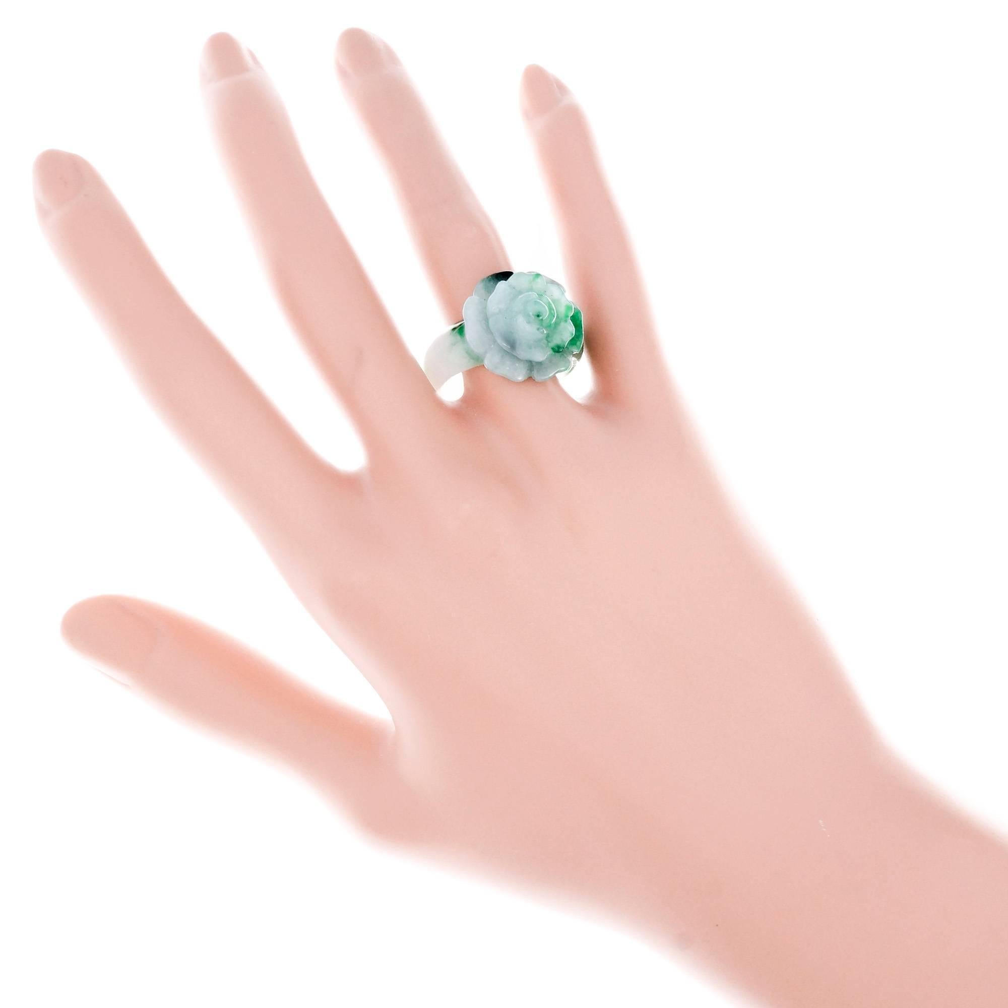 Natural Jadeite Jade blended green, white and dark green color flower ring. Translucent GIA certified natural Jadeite Jade 

1 carved variegated dark green & white Jadeite Jade, approx. total weight 35.06cts, GIA certificate #1182600523
Size 10 and