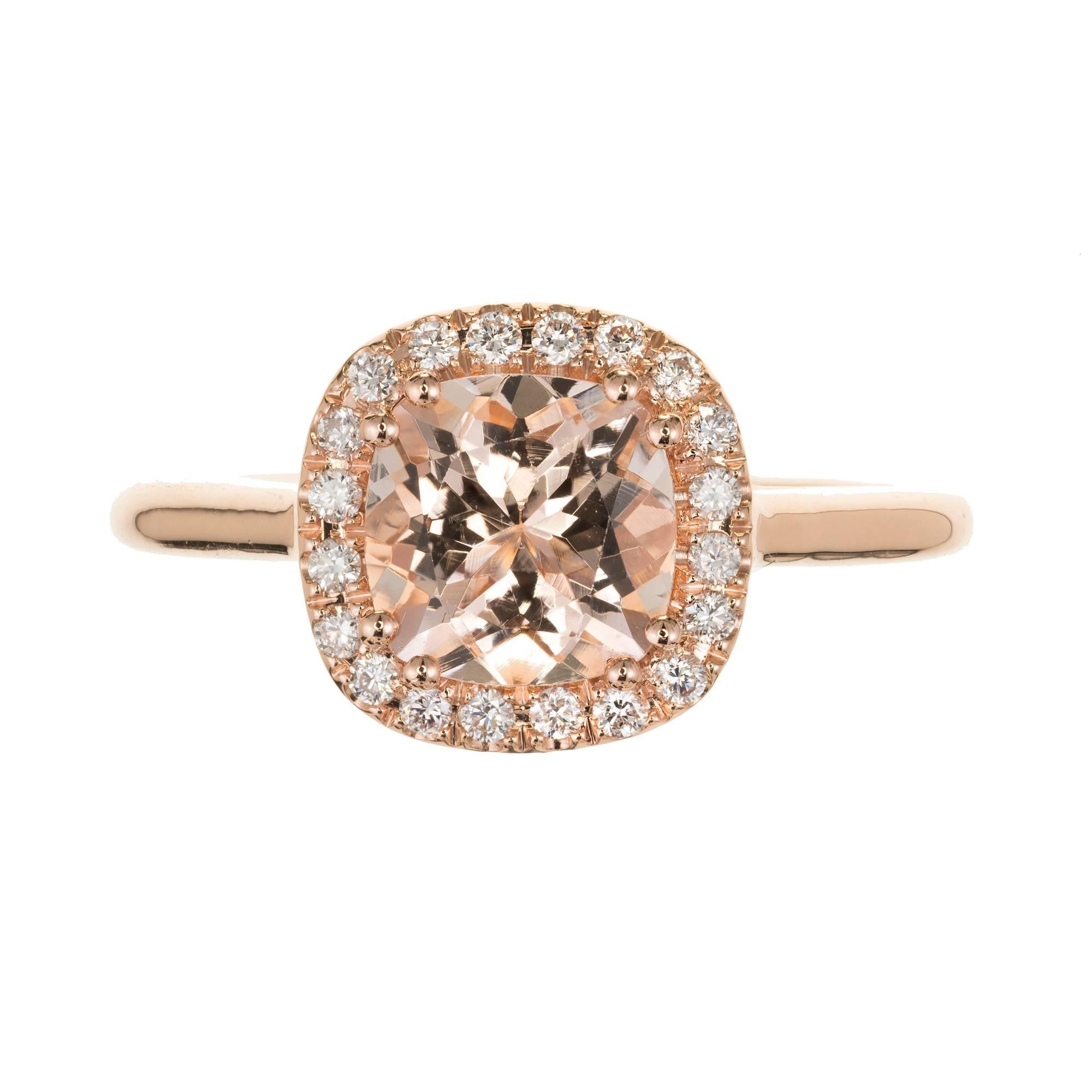 Peter Suchy cushion Morganite diamond halo engagement ring in 14k rose gold setting.

14k rose gold
1 cushion soft pink Morganite, approx. total weight 1.28cts, VS
20 round full cut Diamonds, approx. total weight .14cts, VS
Size 6.5 and