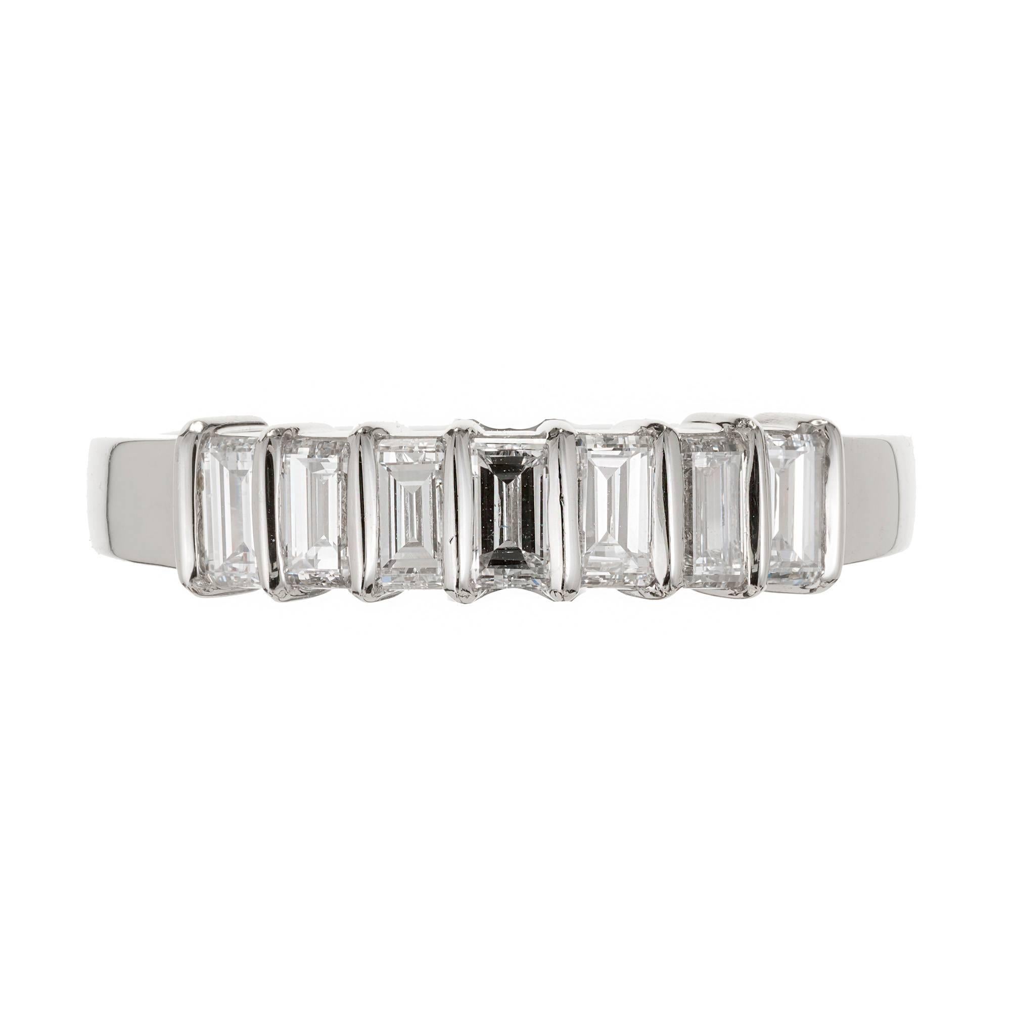 Tiffany & Co Emerald Cut Diamond wedding band with 7 Diamonds bar set in Platinum. 

7 Emerald cut Diamonds, approx. total weight .75cts, F – G, VS
Platinum
Tested: Platinum
Stamped: Plat
Hallmark: Tiffany
Width at top: 4.22mm
Height at top:
