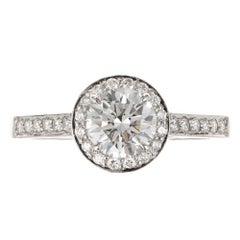 Tiffany & Co .76 Carat Diamond Halo Platinum Engagement Ring