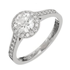 Tiffany & Co .76 Carat Diamond Halo Platinum Engagement Ring