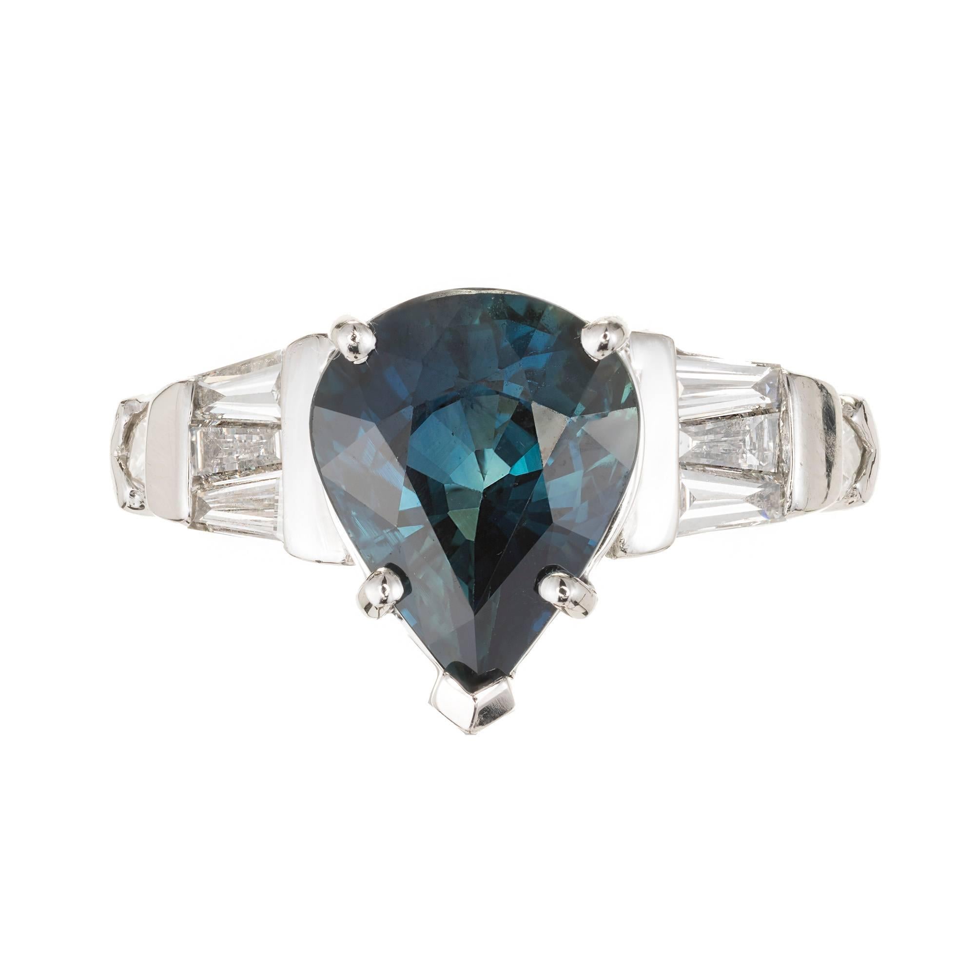 Peter Suchy 4.01ct pear shape blue Sapphire engagement ring. Pear shaped center stone with  pear diamond and baguette cut accent diamonds. GIA certified natural no heat and no enhancements.

1 pear blue Sapphire, approx. total weight 4.01cts, no