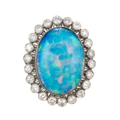 9.41 Carat Oval Blue Opal Diamond Halo Platinum Cocktail Ring
