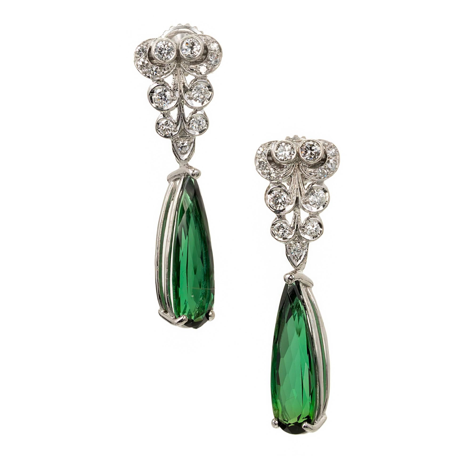 Peter Suchy bright green Tourmaline pear shaped diamond dangle earrings. Platinum tops with old cut Diamonds. 

2 pear shape green Tourmaline, approx. total weight 6.37cts, VS, 6.37 x 2.25mm
12 old European cut Diamonds, approx. total weight .20cts,