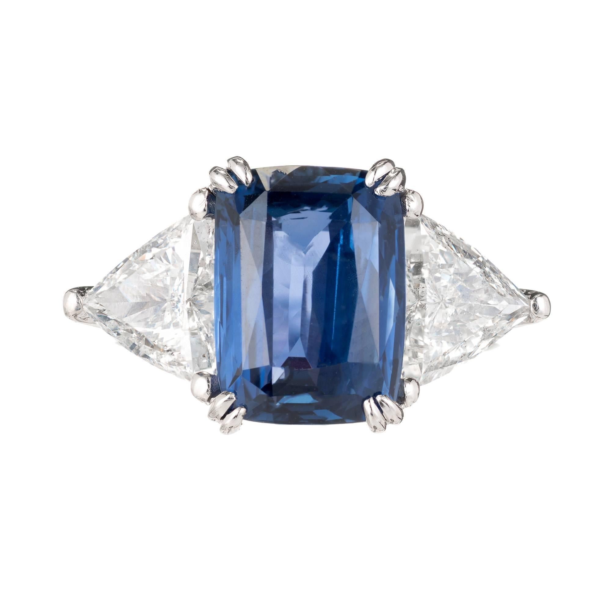 Peter Suchy cushion cut rectangle Sapphire and diamond three-stone engagement ring. GIA certified sapphire all-natural no heat and no enhancements with 2 trilliant cut side diamonds in a platinum setting. The ring was designed and made in the Peter