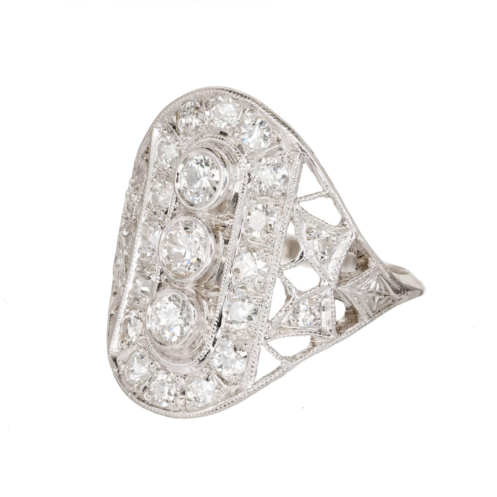Art Deco 1910 vintage open work platinum diamond cocktail ring with Old European cut diamonds. 

3 Old European diamonds F VS approximate .45 carats
20 round Old European cut diamonds F VS approximate .55 carats
Size 6.5 and sizable
Platinum
Tested: