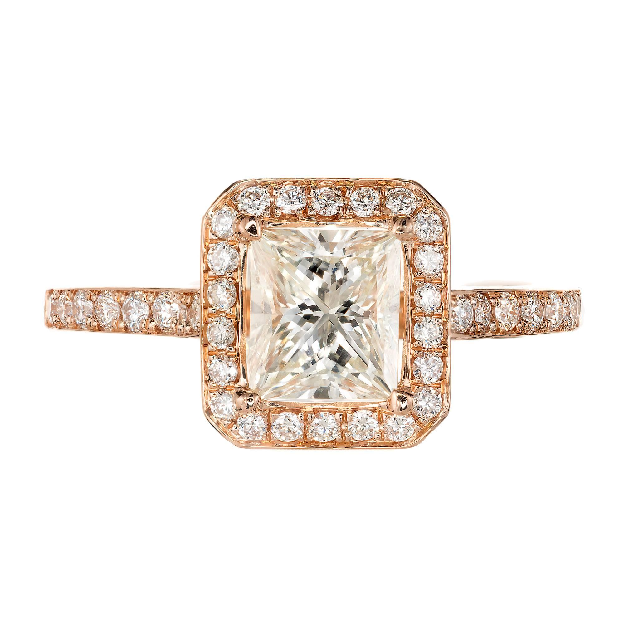 1.00ct Princess cut diamond halo 18k rose gold engagement ring. 1.00ct GIA certified princess cut center stone with 36 round accent diamonds. Created in the Peter Suchy Designs. A wedding band fits flush next the shank. 

1 Princess cut diamond,