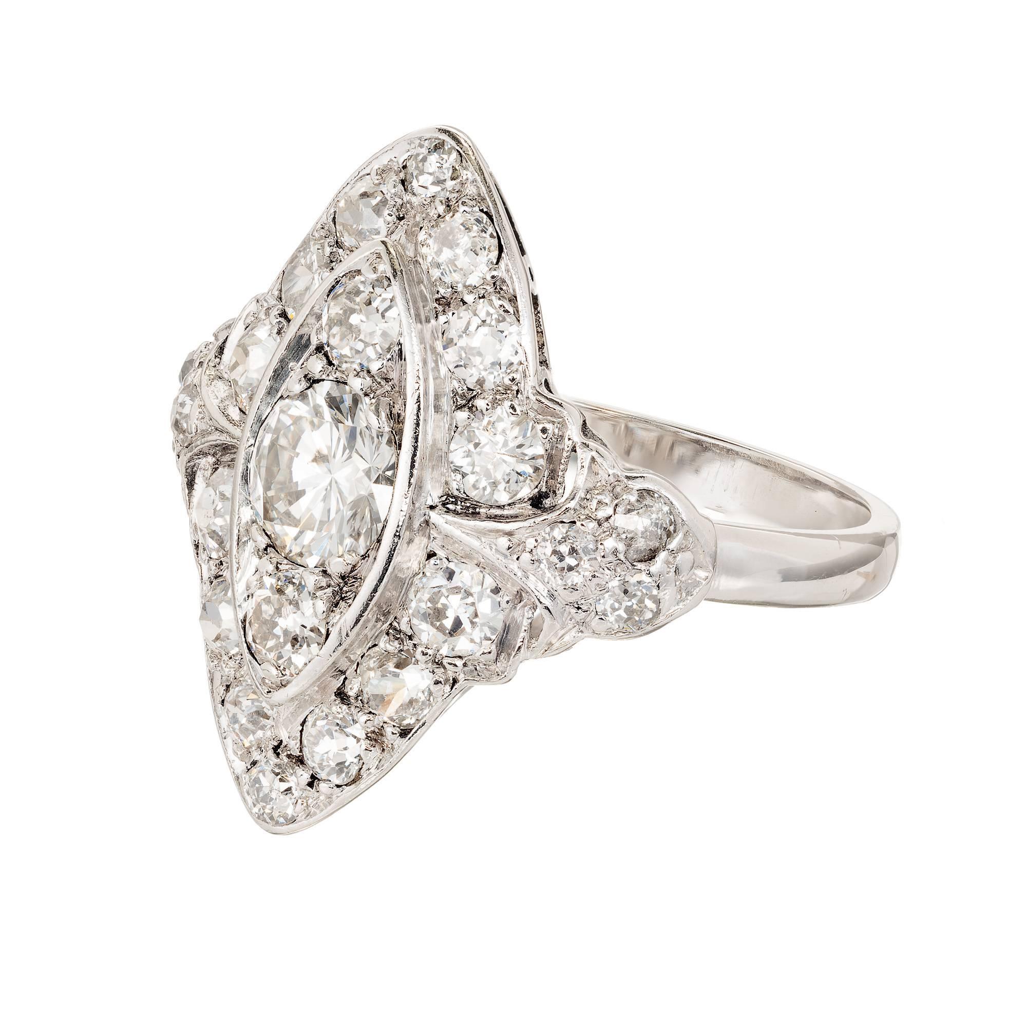 Vintage 1930s Platinum Diamond handmade Marquise shaped cocktail ring set with old European cut bright sparkly Diamonds.

1 old European cut Diamond, approx. total weight .50cts, G, SI1
22 old European cut Diamonds, approx. total weight 1.10cts, G –