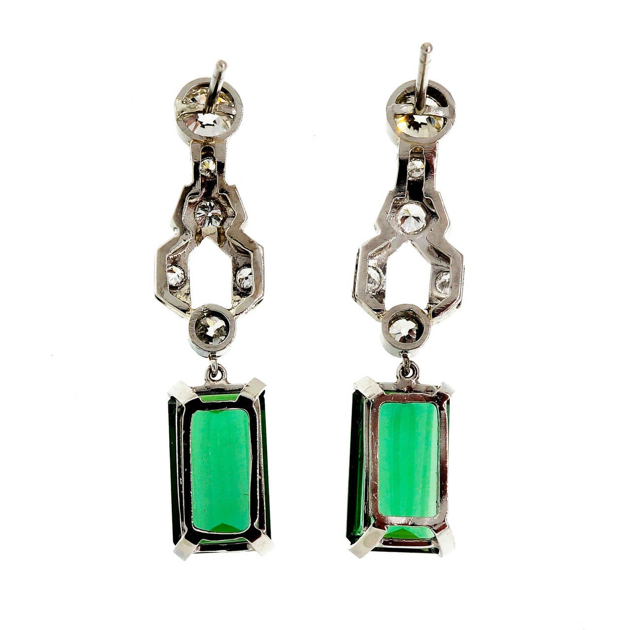Platinum dangle earrings with old European cut diamond tops, diamond dangles and bright pure green Emerald cut Tourmaline dangles.

2 Emerald cut bright green Tourmalines, approx. total weight 6.20cts, VS, 12 x 6.5mm, natural color
2 old European