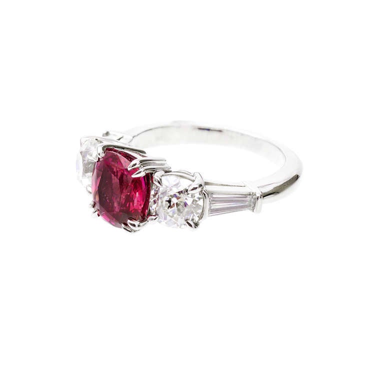 This is a truly beautiful ring. Ultra rare all natural cushion cut extra fine Ruby cushion cut 2.54ct purplish red rare super bright color CMT Type 1 most often associated with extra rare natural purplish red Ruby mixed circa 1900 that lights up as