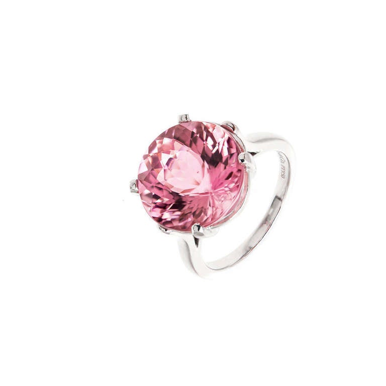Original Tiffany + Co solid Platinum ring. Certified natural no heat super bright medium pink gem cut round Tourmaline. Sold at Tiffany New York circa 1960 to 1970. Extremely well cut and polished. It is very rare for a find a pink tourmaline of