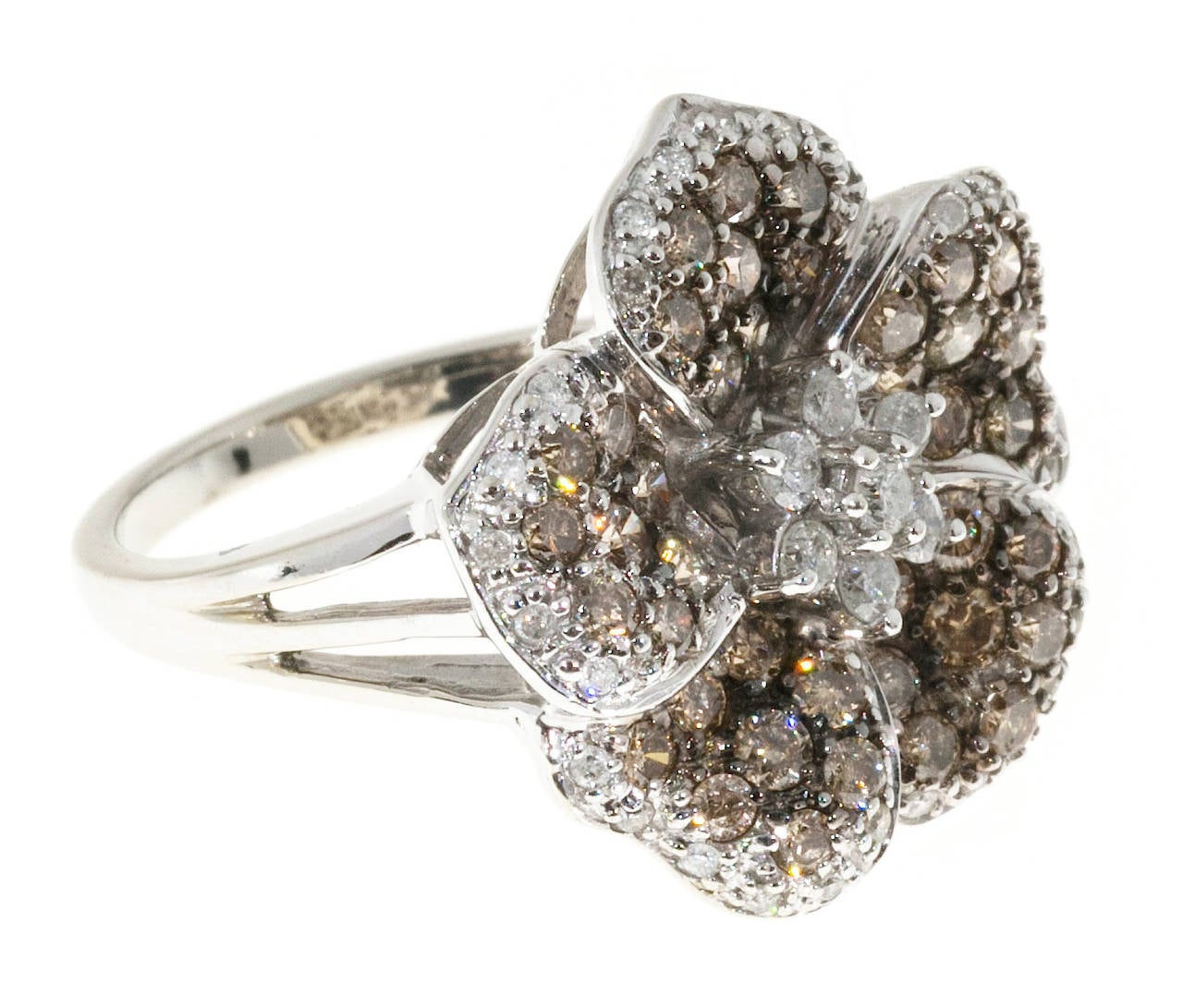 Beautiful 5 petal flower ring with golden yellow natural diamonds and white diamonds all full cut and sparkly.

7 full cut white diamonds approx. total weight .18cts, H, SI
40 full cut natural golden brown diamonds approx. total weight