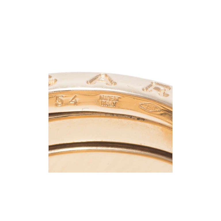 Bvlgari 18k yellow gold flexible wide ring. Excellent condition, no repairs or defects. Looks great on the hand.

18k Yellow gold
Size 7 and not sizable
12.0 grams
Stamped: Made In Italy 750  54
Hallmark: Bulgari
Tested: 18k
Width at top: