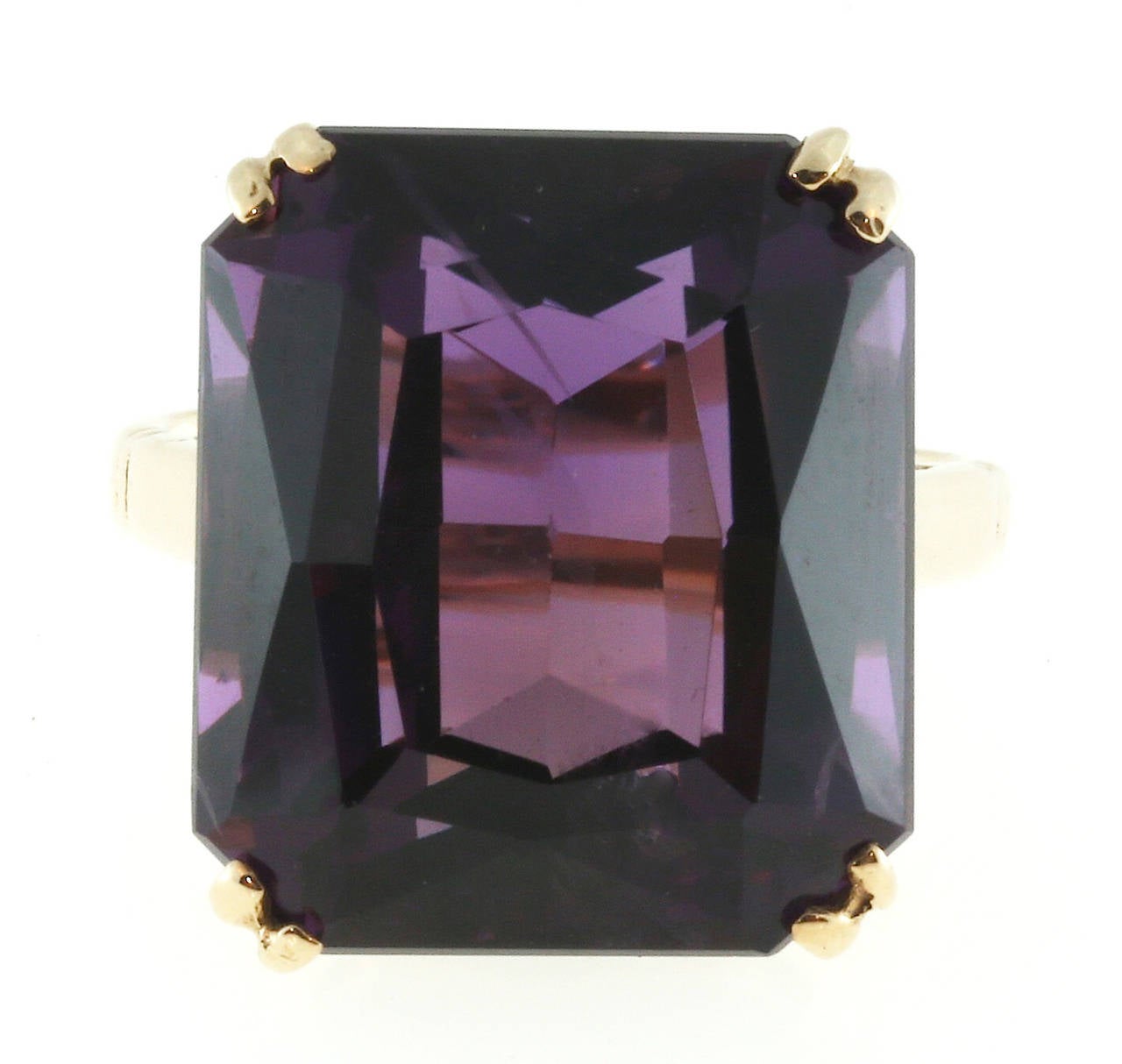 Top gem quality reddish purple 16.02ct  Amethyst, in its original 9k pink gold custom made ring.

1 Bright well cut and well-polished 16 x 14mm top gem slightly reddish purple genuine untreated Amethyst, approx. total weight 16.02cts
Stamped: