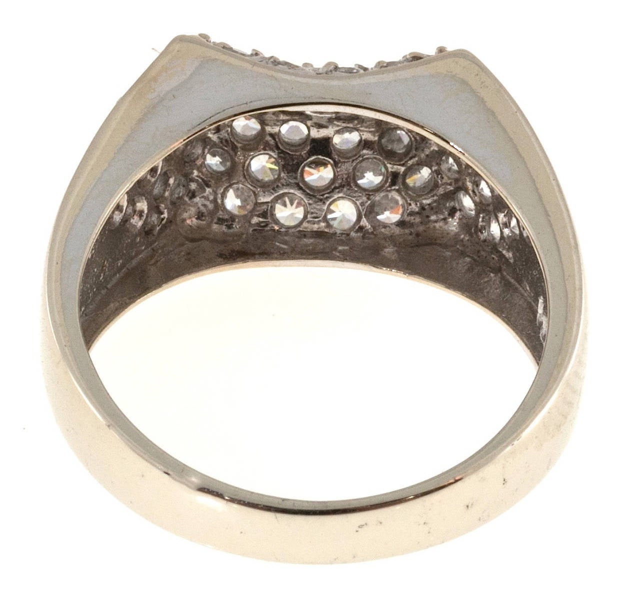 Geometrically styled 14k white gold ring pave set with 56 bright white full cut diamonds.

56 full cut diamonds, approx. total weight 1.12cts, G, SI1
14k White Gold
Stamped: 585
6.2 grams
Width at top: 10mm
Height at top: 5.5mm
Width at