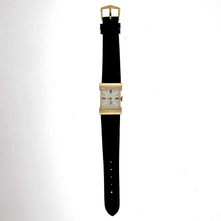 Tiffany & Co. yellow gold hooded hinged-lug Strap wristwatch, circa 1950s. 

18k yellow gold
Width without crown: 21.13mm
Width with crown:	22.93mm
Band width at case: 20mm
Case thickness: 7.8mm
Dial: Tiffany & Co., 
Outside case: 6072