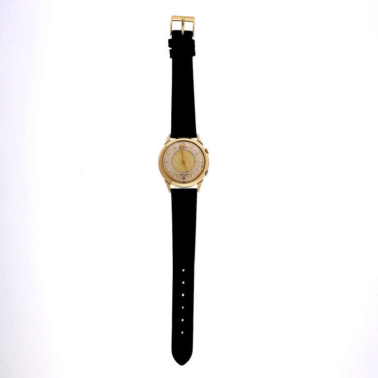 LeCoultre 14k yellow gold manual-wind Memovox alarm wristwatch. All original crowns, crystal, dial and case, circa 1960s.

14k yellow gold
Width without crown: 34mm
Width with crown: 34.6mm
Band width at case: 17mm
Case thickness: