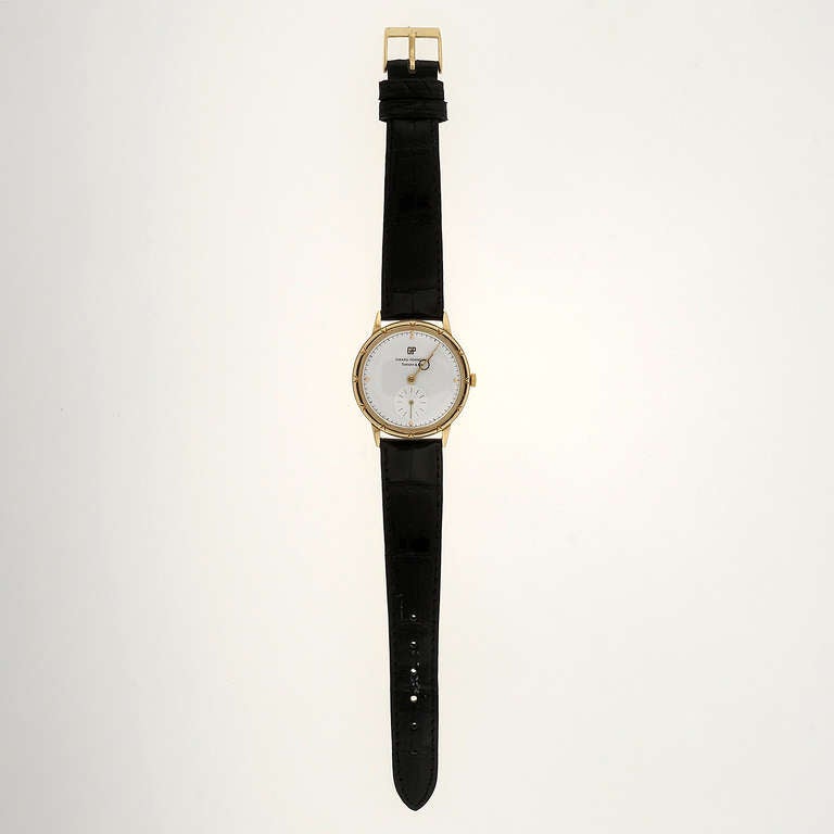 Girard-Perregaux 14k yellow gold wristwatch, retailed by Tiffany & Co., circa 1960s. Bezel enhanced with 