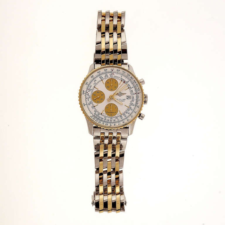 Breitling stainless steel and 18k yellow gold Navitimer Chronograph wristwatch with date, circa 1995.

Stainless steel and 18k yellow gold
143.6 grams
Length of Bracelet: 7 7/8 inches
Width without crown: 40mm
Width with crown: 43mm
Band